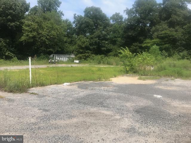 FORMER GAS STATION CONVENIENCE STORE. ONLY 5+ MILES FROM EASTON. BUILDING IS GONE, SEPTIC, WELL, ON CORNER OF HIGH TRAFFIC HIGHWAY, VILLAGE CENTER ZONING. ALMOST 5 ACRES. MOST OF THE PERMITTING PROCESS IS DONE FOR NEW BUILDING AND BUSINESS. EXCELLENT OPPORTUNITY FOR MANY USES. UNDERGROUND TANKS HAVE BEEN REMOVED AS PER EPA. THIS IS THE MAIN ROUTE FROM LOWER DELAWARE TO EASTON AND MIDSHORE.
