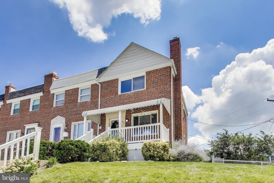 Dreams Do Come True!  Motivated Seller. Closing help is available to help start your story at 4301 Roberton Avenue.  Newly renovated.  Where timeless charm meets modern luxury. This fully renovated end-of-row brick Colonial townhome isn’t just a house—it’s the start of your next chapter.
As you approach, you’ll be greeted by mature landscaping and flourishing rose bushes that frame the freshly finished front porch, creating a sense of warmth and welcome. Step inside to discover a sun-drenched living space where beautifully refinished natural hardwood floors and elegant details like crown molding and chair rails set the tone for refined living.
The heart of the home is the chef-inspired kitchen, thoughtfully designed with quartz waterfall countertops, a jumbo refrigerator, five-burner gas stove, and smart stainless-steel appliances. The bonus breakfast bar offers extra counter space and makes entertaining effortless.
There is one Generously sized Bedroom room on the main level. Whether you dream of a home office, media room, or guest suite, this space adapts to your needs. 
Upstairs, two more generously sized bedrooms provide peaceful retreats, all with ample closet space and ceiling fans. The luxurious full bath features sleek modern finishes.
The fully finished walkout lower level has the kitchen and adds versatility with a spacious half bath, and laundry area with brand-new washer and dryer. 
Out back, the large fenced corner lot is a true oasis. Relax under the covered patio, surrounded by mature trees and blooming roses, or host summer gatherings in your private backyard. There’s even potential to convert part of the patio into a rear parking pad for added convenience.
With a newer roof, HVAC, windows, and mechanicals (all updated within the last 5 years), this home is completely move-in ready. Its prime location offers easy access to major thoroughfares, parks, dining, shopping, and community amenities. Yes! Dreams Do Come True! You've found your new home. Claim it Now
Closing help available! Don’t forget to ask about “Live Near Your Work” credits and other grant opportunities.