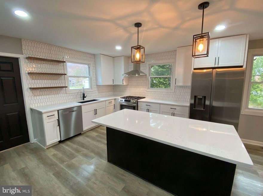 Beautiful Remodeled Rambler on .46 Acres! This Move-In Ready Home Features New Cabinets, Stylish Island with Pennant Lighting, QUARTZ Counters, Stainless Steel Appliances (2026), and a Modern Tile Backsplash. Enjoy New Lighting Throughout (2026), Updated Bathrooms, Brand New Flooring, New Water Heater (2026), and Fresh Custom Paint that gives the Home a Bright, Modern Feel.  Situated on a Spacious .46 Acre Lot, This Property Offers Plenty of Room to Relax, Entertain, or Create Your Ideal Outdoor Space. A Perfect Blend of Modern Updates and Comfortable Living. Hurry This Will Not Last