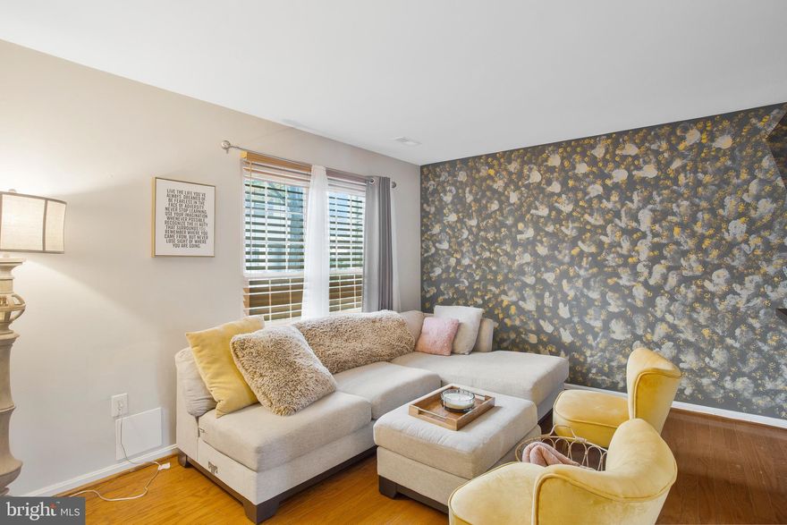 BACK ON THE MARKET- Buyer's FInancing Fell Through. PRICE REDUCED $10K! Newer Updates- This 3 Bed and 1.5 Bath two-level colonial townhouse is waiting for it's ready for all your holiday gatherings! The entrance is light-filled and flows to the living room with gleaming hardwood floors; combined kitchen and dining room space with large windows and new floor tiles. The kitchen is updated with granite countertops, stainless steel appliances, microwave and tons of cabinet space. Upstairs boasts a large master bedroom with TONS of closet space and an updated bathroom with newer tiles, vanity, toilet & lighting fixtures. Two additional bedrooms and a full hall bath located here as well. Property boasts with newer plumbing and electric fixtures, newer paint in and out, updated roof, newer interior and exterior doors and a private backyard that is perfect for outdoor entertaining. ***FULLY updated in 2020. Schedule your tour today- you won't want to miss this one!