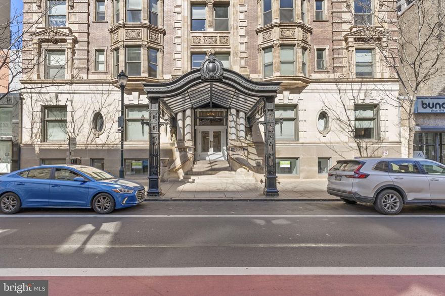 Premier 1- BD, 1- BA residence at The Belgravia, a distinguished historic building designed by Milligan & Webber in 1902, ideally located in the heart of RITTENHOUSE SQUARE one of Philadelphia’s most coveted neighborhoods. The building’s beautifully restored terra cotta and limestone façade makes a striking first impression, complemented by a grand lobby featuring original stained-glass windows, 24/7 concierge service, on-site property management, and elevator access. Inside the residence, a welcoming foyer leads to rich hardwood floors, oversized windows, and refined finishes throughout. The spacious great room offers flexible living and dining areas, perfect for both everyday comfort and entertaining. The open-concept kitchen is thoughtfully designed with granite countertops, stainless steel appliances, and a breakfast bar, making cooking and hosting effortless. The sun-filled bedroom provides a serene retreat with plush carpeting, generous closet space, and tranquil city views. The spa-inspired bathroom is finished in elegant Carrera marble, creating a luxurious atmosphere. A convenient in-unit laundry closet completes this well-appointed home. Residents enjoy access to an on-site fitness center and are just steps from world-class shopping, dining, and grocery options along Chestnut and Walnut Streets. With easy access to the Schuylkill River Banks trail and a quick commute to the University of Pennsylvania, Drexel University, and University City, this location offers unmatched convenience. RITTENHOUSE SQUARE PARK is just one block away placing the very best of Center City living right outside your front door.