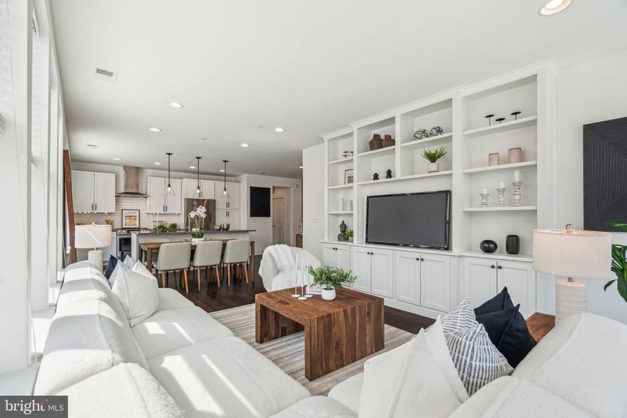 Sun-filled corner two-bedroom, two-bathroom condo with deeded parking now available at 2400 South. Enter through a foyer into an open kitchen & living room with windows wrapped on two sides. The kitchen is a fantastic space for everyday cooking and entertaining, featuring a large island, stainless steel appliances, a vented range hood, and ample cabinetry. The living area is spacious, with custom built-ins, high ceilings, and hardwood flooring. The bedrooms are on opposite ends of the condo, allowing for added privacy. The primary bedroom features an ensuite bathroom with a double sink vanity, glass-enclosed shower, and a walk-in closet. The 2nd bedroom is adjacent to a hall bathroom with a bathtub/shower combo and single vanity sink. Rounding out the condo is a laundry closet with a fully sized washer & dryer plus storage and a large linen closet. This prime location is in Graduate Hospital, adjacent to Fitler Square, and surrounded by favorite neighborhood restaurants (Sabrinas, Ants Pants, Igloo Grace Tavern) and retail conveniences - such as Heirloom Market & South Square Market, also within a short distance to CHOP, Penn & Drexel. This secured elevator building features a fitness center and gated courtyard for residents.