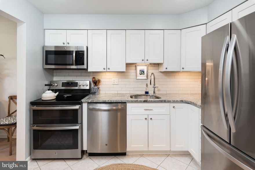 Back on the market thru no fault of the seller.  Beautiful Bright and Sunny home with Updates and Designer finishes in every room.  Home is move in ready, very private with 1st floor patio walkout.   HVAC 2020, HW Heater 2019, Stove (convection and warming drawer), Dishwasher, Fridge and Washer/Dryer 2017.  Plenty of storage.  Easy access to 83 and 695.