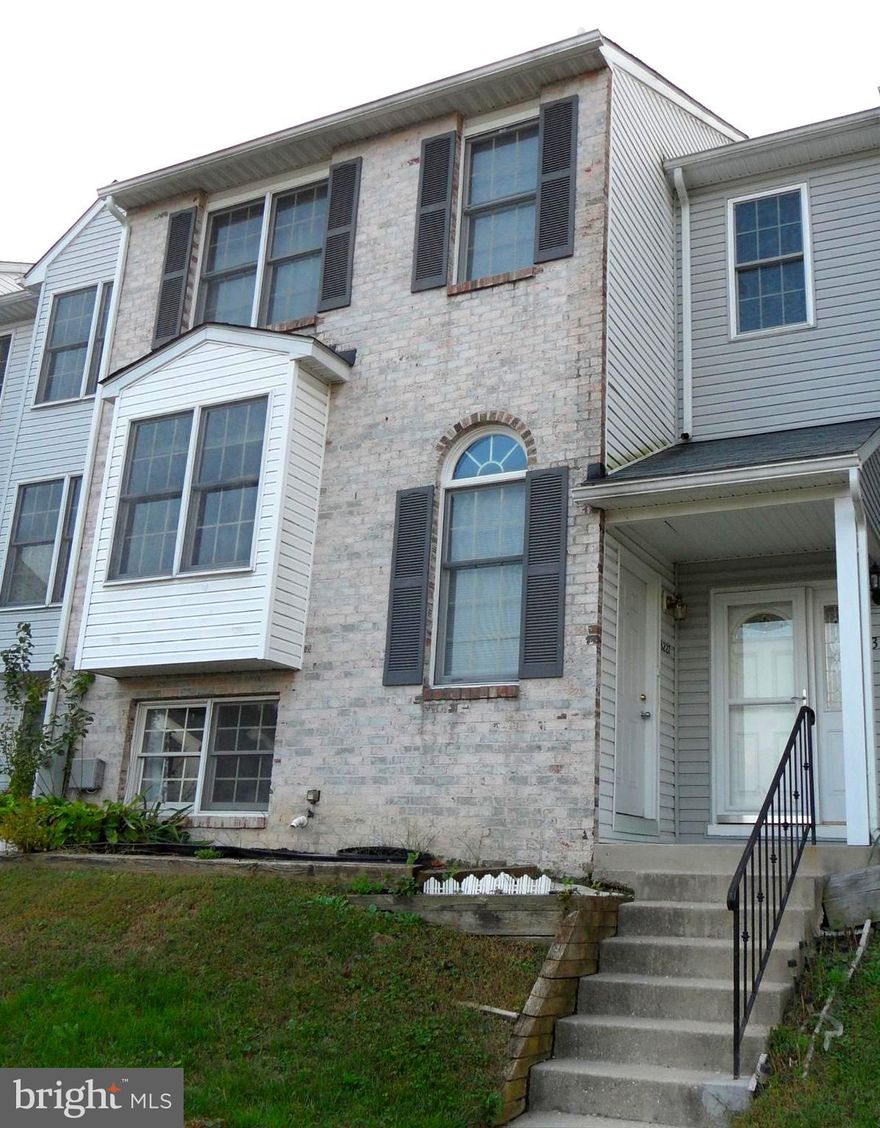 Very clean unit. New kitchen cabinets and granite counter tops.  New hardwood floor on upper level and stairs. New tile flooring on lower level and entry. 3 bedrooms, 2 and 1/2 bathes. fireplace, deck and walkout on lower level. Near Highways 29, 100 and 70. Close to shopping and all the conveniences for daily living. Walking distance to Super Walmart and other supermarkets. Ample parking spaces. No pets.