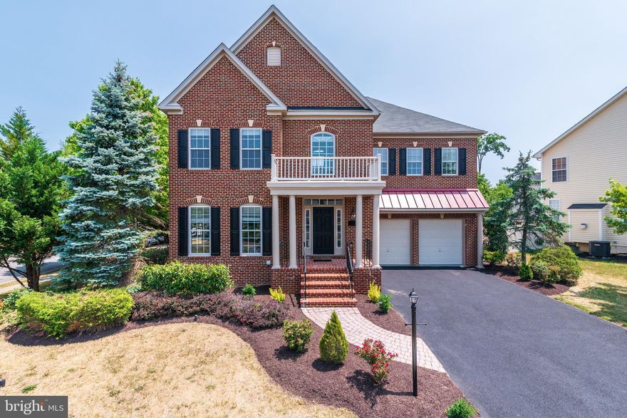 OPEN HOUSE CANCELLED!!!! NO SHOWINGS PLEASE.
Welcome to the original NVR-Ryan Tolstoy Model Home recently refreshed, this home is a luxury oasis with tons of room for family and friends to enjoy.  Custom hardscape path to front entry way with architectural pillars, a large, gracious 2 story foyer with double staircase and 2 story beamed ceiling family room.  Every possible bump out, room extension, bay window, bathroom/kitchen upgrade was selected for this former model home.  As currently set up the home has 4 bedrooms, but new owner can convert large Sunroom and/or large Study easily to accommodate up to 6 legal bedrooms.  House has an elegant and entertaining flow with hardwood in formal living/dining/foyer/powder/hallway/sunroom and study. Tile in the kitchen/breakfast room and laundry.  
The upper level has a gracious entry with double hardwood staircase open to below and bridge to owners bedroom overlooking 2 story family room.  Owners suite is very large with cathedral ceiling, large sitting room, tray ceiling in bedroom, his/her walk-in closets, and a luxurious spa bathroom with tub, double vanities, and walk-in shower.  Upstairs includes 3 additional spacious and well-lit bedrooms. Two bedrooms share a jack-and-jill full bath and 3rd bedroom has a private full bath attached.  
Lower level is all about entertaining,  with a cavernous game/rec room that can fit multiple areas including sofa set, pool table, foosball table etc.  Large double doored exercise room is well lit, with tray ceiling and fitness equipment is included.  Large media room has space for any type of seating and built in modern stainless steel bar counter and 2 small beverage fridges and cabinet storage.  Rounding out the basement is an additional full bath and a clean and painted floor storage room boasting 500 sqft. for plenty of storage.
The exterior home follows the elegance of the inside with a nicely landscaped yard with mature bushes, front brick patio paver walkway and rear has peaceful rear paver patio with entrances from the morning room and sunroom.  The location of the house is close to the community open space/tot lot and only a 5 minute drive from all shopping and required amenities.  2 car garage is finished with painted walls and freshly painted floor and 2+ additional cars can be parked on the gently sloped driveway.
Original owners have continuously maintained this home with much care.  Being a former model, every room has customizations like wall paneling, custom painted floors, wall sconces, tray ceilings with lighting, cathedral ceilings in morning room and primary sitting room.  The house is flooded with natural light due to the abundance of windows and multiple 2 story ceiling rooms bringing light into every room of the house.  Don't miss the opportunity to own one of the premier former model homes in the area.