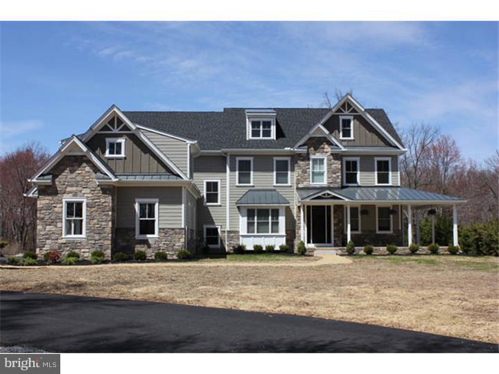 Just completed masterpiece designed by Philadelphia Magazine 2009 architect Thomas R Wittemann,AIA. Beautifully oriented on a 1.3 acre site, this 3 story Crafstman style, 5 bedroom, 4.2 bath 7,320 square foot home is replete with high end amenities and mill work. Side-entry with transom window into mud room with custom built cubbies and powder room with Kohler fixtures. Decora custom inset-door kitchen cabinets with undermount cabinet lighting, 60" full size commercial Wolf range (griddle and grill), Vent-a-hood ventilation, Subzero 48" built-in refrigeration with icemaker and Kohler stainless steel farm sink with Delta touch faucets. Oversized island for 5 bar stools with built-in custom butcher block countertop perfect for kitchen prep and island sink. Lutron RadioRa lighting system controls dimmable lighting in kitchen, outdoor and breakfast area. Picturesque breakfast room with wonderful sunlight that opens into the 2-story family room and fireplace with balcony to 2nd floor. Formal dining room with tray ceiling, foyer with herringbone hardwood floors, bright living room with fireplace and study with great view of backyard finish out the floor. 1st floor contains finished in place hardwood floors with wainscoting and oversized crown molding throughout. Main stair and back stairs up to the 2nd floor contain master bedroom with wainscoting, his closet, her closet with sitting room and make-up area, master bath with Kohler bubble tub, carrera tops and mocha marble tile with oversized shower and his & hers vanities. 2 bedrooms with Jack-and-Jill bath, marble tops, Kohler vessel sinks and wall mounted faucets. Princess bedroom with full bath. Laundry with granite tops and laundry sink next to master bedroom, finished basement with custom bar area, separate gym room, full bath with changing area, shower setup for steam, unfinished area for wine room could be finished, 1st and 2nd floors have finished in place hardwood floors with recessed lighting throughout, Lemieux solid doors with flat black Emtek hardware throughout. Additional features include solid cedar garage doors, Andersen double-hung windows, alarm system, Hardi-plank cement board siding, Kohler fixtures and Restoration Hardware lighting fixtures and vanities. Rear yard has unfinished pool which could be finished as option, also available 2-car detached garage with pool house and outside living room could be built. Flexible settlement date