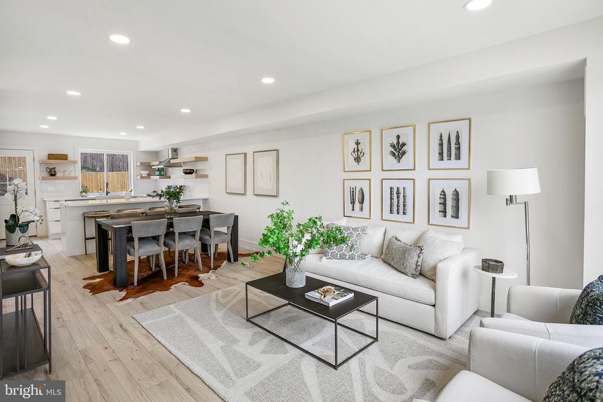 Welcome to 1608 W Street Northeast, a beautifully renovated gem that combines modern flair with classic charm. Step inside to discover a thoughtfully redesigned interior, featuring an open, airy layout perfect for relaxing or entertaining guests. The modern kitchen boasts contemporary finishes, open shelving, and a spacious layout with counter seating and a dining area. The upper level has 3 bedrooms, including a primary bedroom with two closets. The fully finished basement offers endless possibilities, from a cozy lounge to a creative workspace, or additional rental income with its own entrance. There is a private parking pad in addition to ample street parking out, plus a patio and green space in the backyard. Don't miss out on this perfect blend of style and functionality! This home qualifies for the Welcome Grant Program which gives qualified buyers up to $10,000 towards your purchase!