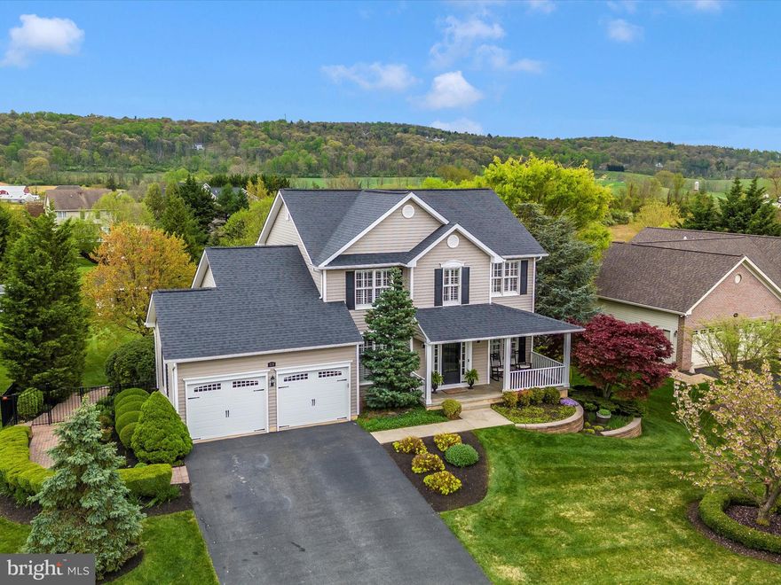 Immerse yourself in luxury with this exquisite custom-built Admar colonial nestled in the sought-after Middletown community of Foxfield.  Larger lot with loads of upgrades and custom finishes.  Breathtaking mountain views from the kitchen sink window, rear screened (and covered) porches.  Stunning remodels to the kitchen and bathrooms.  Built-ins, and even custom closets.  Entertainers dream with a wonderfully designed kitchen with a large island, custom cabinets, and Frigidaire professional appliances. Custom hardwood floors (on main and upper levels), steps, banisters, and posts.  Functional first-floor laundry room with beautiful cabinetry.  Large bedrooms.  Private oasis in the primary bedroom ensuite with ambient heated floors, stunning tile work with soaking tub. Walk-out level basement offers full-size windows, a bedroom, a full bath, a wet bar, and a private media room. Extensive hardscaping with beautiful gardens and aluminum fenced rear. Even unwind in style with the hot tub under the covered porch! Upgraded door hardware, light switches and fixtures. 240V plug in the basement (currently used for a sauna) and wiring for a generator is in place.  New garage door openers as well.  Roof (2018).  HVAC (2013).  Water Heater (2017).  Model home condition with no detail missed.   Live the life you've always dreamed of here, with nothing to do but move right in and make it yours.  HIGHEST AND BEST DUE BY SATURDAY, MAY 4 at NOON.  OPEN HOUSE CANCELLED.