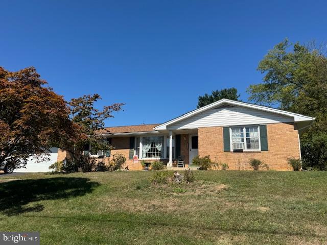 3-4 Bedroom, 2.1 bath rancher in Pleasant Acres, close to schools and new athletic fields. Brick construction with newer architectural shingle roof, brick fireplace in sitting area and large covered patio that overlooks the back yard. Plaster walls, pegged hardwood floors and slate entry are a few signs of the quality of this home. While there are updates and cosmetics needed, you wont be sorry investing in this quality home. There is a first floor laundry room with half bath. The basement is mostly an open slate for you to finish as you like, but there is already a 4th bedroom/office finished and ready for you.