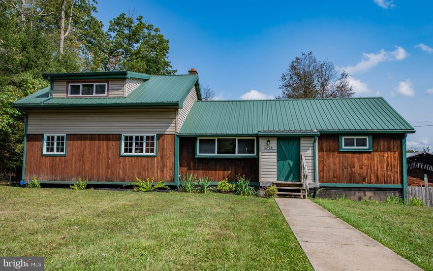 Here's your chance to own a totally updated 3BR/2BA cabin/home featuring an open kitchen/living room concept with beautiful wood cathedral ceilings. The kitchen highlights new custom cabinetry and granite countertops. There are two updated full bathrooms, one with a surround tile shower and the other an oversized soaking tub. There are two heat sources - an oil hot water furnace new in 2022 and two pellet stoves (one in the upstairs living room and other in the basement). Drive your ATVs/mower into basement through the newly installed double doors. Large fenced-in backyard. Not only is it closely located near PA State Game Lands and ATV trails, but a short walk to the popular Mountain Top and Provisions restaurant. Drive your ATVs from cabin to the ATV trails. Being offered at $379,900.