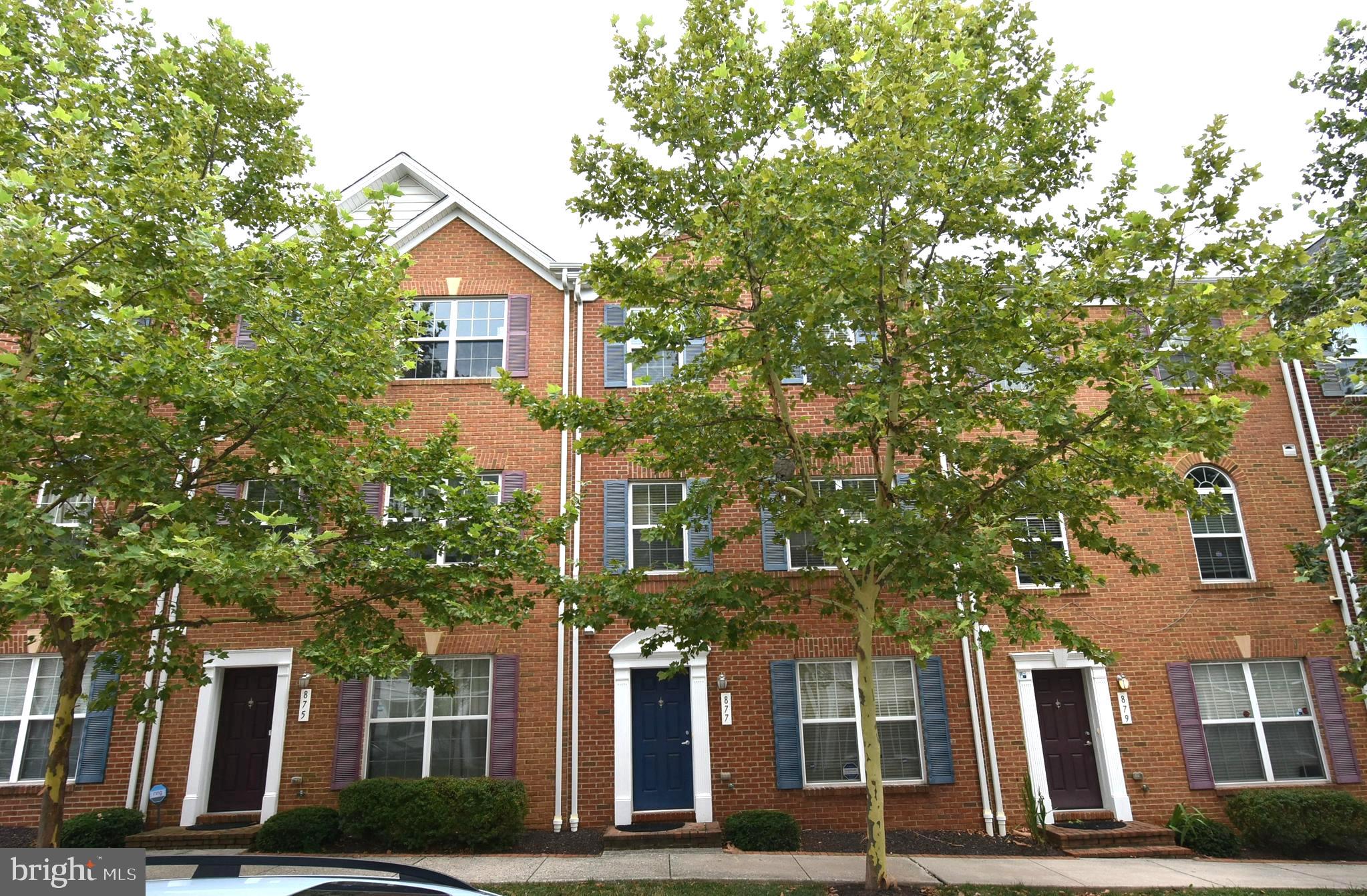 Experience sophisticated city living in this impeccably maintained brick-front townhome with an attached two-car garage, nestled in the sought-after Camden Crossing community. Spanning three thoughtfully designed levels, this residence is ideally situated near Baltimore’s premier landmarks—the University of Maryland Medical School, Camden Yards, M&T Bank Stadium, and the vibrant Inner Harbor. Boasting four spacious bedrooms and three and a half elegantly appointed bathrooms, the home features gleaming hardwood floors throughout the main level and a gourmet kitchen adorned with granite countertops and stainless steel appliances. The serene owner's suite offers vaulted ceilings and an indulgent garden-style bath with a soaking tub and separate shower. A generous rear deck invites effortless entertaining and summer relaxation. Enhancing its appeal, the community also offers a beautifully landscaped park—perfect for leisurely strolls with your dog beneath changing seasonal foliage. Blending comfort, location, and timeless charm, this home presents an exceptional opportunity for discerning professionals seeking the ideal Baltimore City haven.