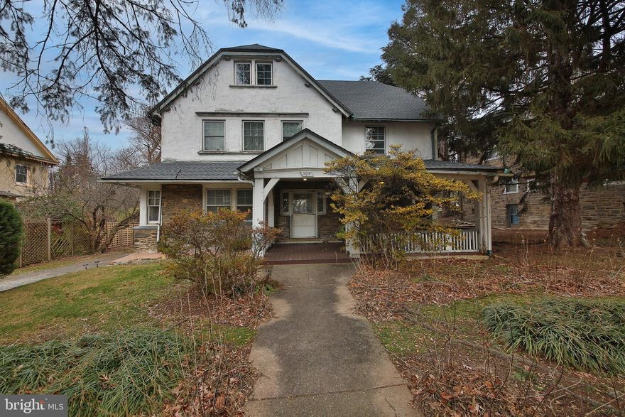 GREAT OPPORTUNITY!! PRICE REDUCED!! Tucked away on a quiet, mature street in historic East Oak Lane, this stately 3-story detached home blends timeless old-world charm with thoughtful updates. Lovingly cared for by the same owner for over 46 years, this 6-bedroom, 2.5-bath residence is filled with character-rich details--- deep windowsills, hardwood floors, pocket doors, high ceilings, abundant wood moldings, and a classic fireplace adorned with Mercer tile that anchors the main living space. Huge formal dining room with recessed lighting offers the perfect setting for hosting upcoming holiday gatherings and memorable celebrations. The expanded kitchen provides a large walk-in pantry and plenty of room for culinary creativity, making entertaining effortless. There is also a sliding door to backyard and a 2nd staircase for easy access upstairs.  There is a powder room on the 1st floor and full bathrooms conveniently located on both the second and third floors, providing flexible living arrangements for guests, family, or home office needs. The 2nd floor bathroom has dual vanity, stand up shower and cast iron clawfoot tub. Recent upgrades include a new roof (2022) and a professionally waterproofed full basement, offering peace of mind for years to come. Additional features include a private rear yard and a large driveway leading to a 1-car detached garage—rare and valuable off-street parking in such an accessible location. The inviting covered front porch is massive and has maintenance free decking which adds to the warmth and charm of this exceptional home. Enjoy the convenience of nearby shopping, local restaurants, SEPTA Regional Rail and subway lines, major roadways, proximity to Montgomery County and Center City. Full of history, character, and potential, this gracious home is ready for its next owner to add their personal touches and make it their own. Schedule your private tour today!