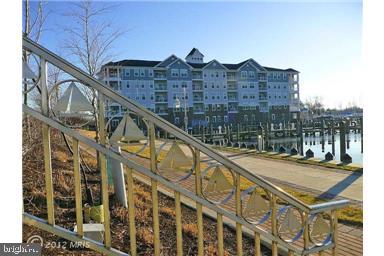 Available 8/15/2020 . Bright open end-unit condo w/water views in gated waterfront community of Deep Harbour. Chesapeake model. Master bedroom & bath with walk-in closet. Spacious eat-in kitchen w/breakfast bar, separate dining room, balcony, laundry room. Assigned secured garage parking. Community amenities include pool, marina & river walk. Easy access to Rt 50 .Pets case by case. Online application- Fee $30 per applicant includes credit check, background check and references . Owner requires minimum Credit Score of 650 and full application for each occupant of household over 18. MINIMUM 48 HOUR NOTICE REQUIRED FOR SHOWINGS.