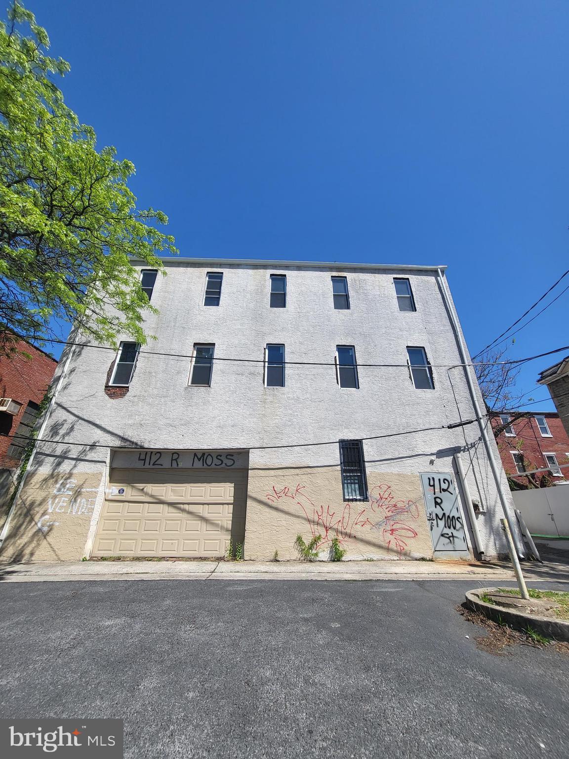 Your next business property is here! Presenting 412 Rear Moss St! This is a 3 story 5,106 Sq ft. Commercial building! Open and ready for many business uses! The first floor has 2 garage doors and perfect for parking or auto uses providing 1700 sq ft to park or store 5 - 6 cars! The second and third floor are open spaces with 10 ft + ceilings that provide endless possibilities: Storage, warehouse, manufacturing, flex space, self storage units and more. So many possible ideas to develop here, set up an appointment today!