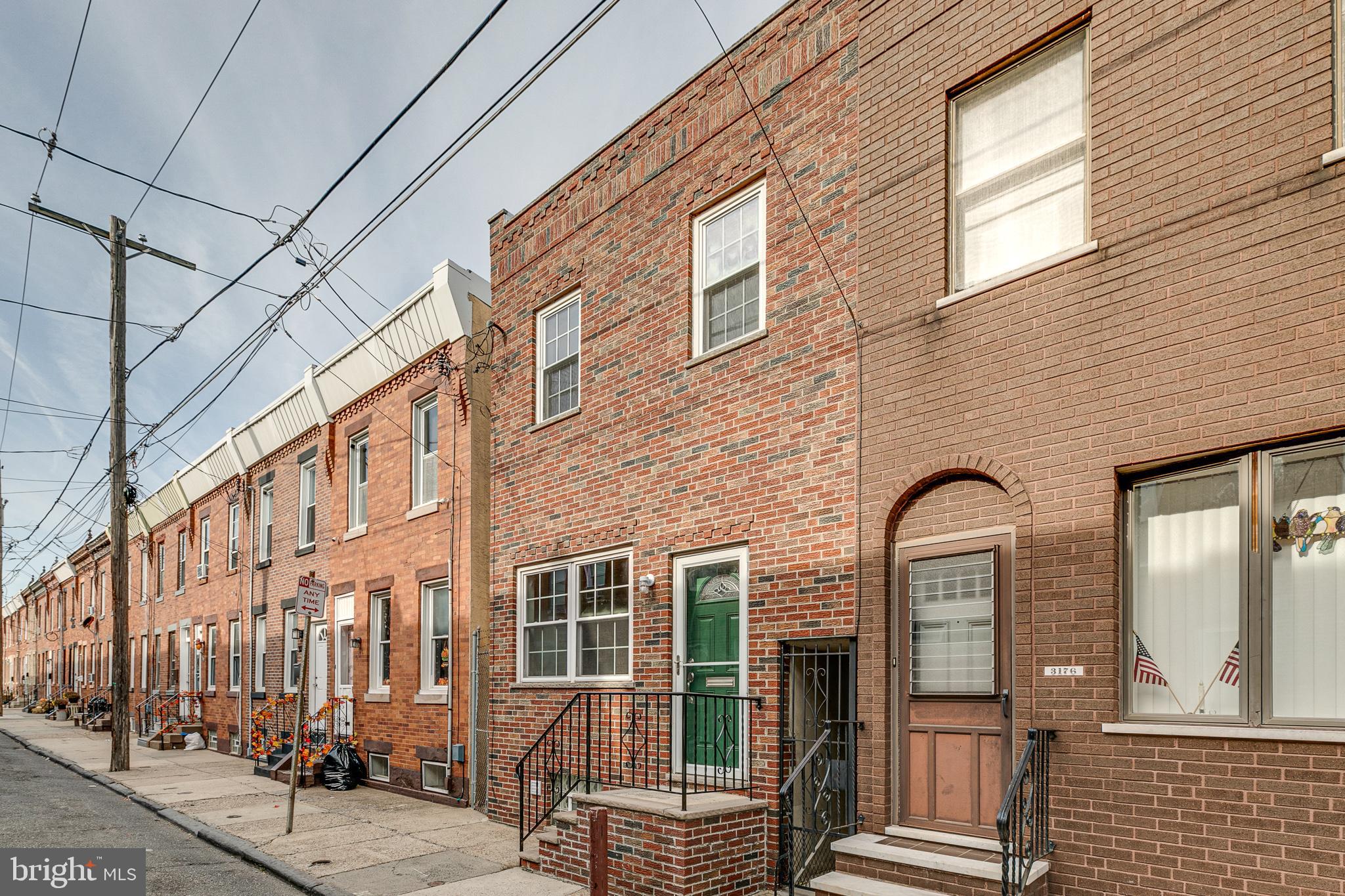 A spacious and composed row home located in the heart of Port Richmond. 3174 Miller Street has been thoughtfully preserved from tip to toe and is ready for its next occupant. The main living space is anchored by a large front window that allows natural light to pour in and cover everything from the high ceilings to the refinished hardwood floors. Towards the center of the main floor is the proper dining area, providing generous space to play some vinyl, make a cocktail, and host loved ones. Pass through the arched entryway to access the kitchen adorned with butcher block counter tops, black hex tile floors, subway tile backsplash, and the continuation of natural light. The backyard is flanked by mature roses and hydrangeas, and offers an enclosed egress, ideal for trash day. On the second floor is the 3-piece bathroom with stall shower, pedestal sink, and casement window. The middle bedroom is surprisingly spacious and can fit a queen bed with ease. Located at the front is the massive primary bedroom, featuring an ideal amount of closet space, and a generous footprint to furnish your oasis. 3174 Miller Street is located within walking distance to Her Daughters, Campbell Square, La Roma, and all the local favorites found on Richmond Street. We welcome your visit!