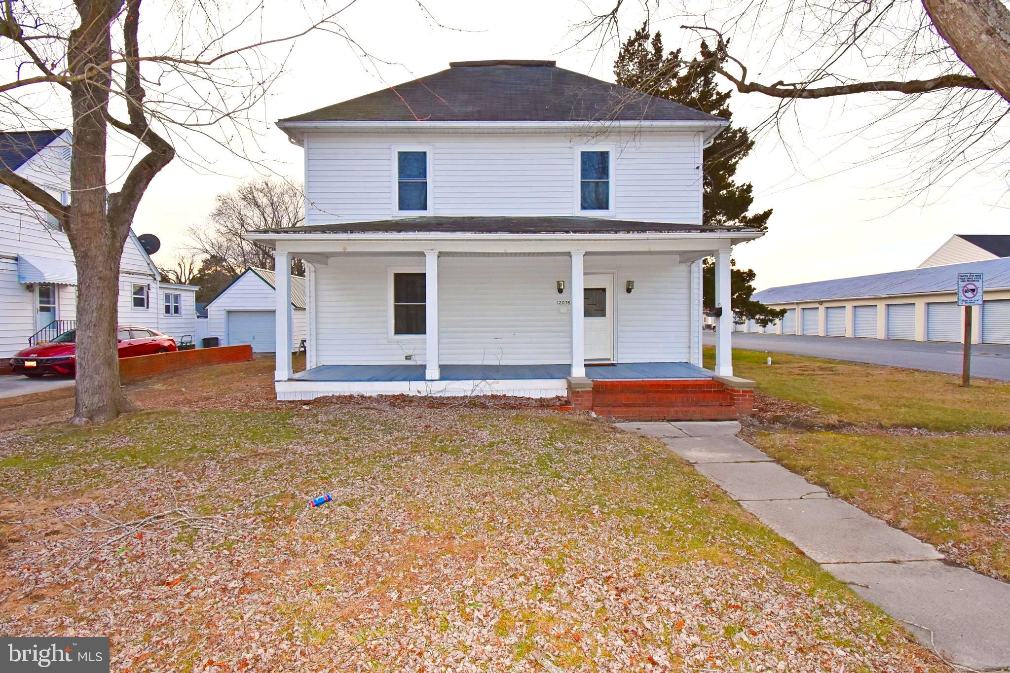 This charming 5-bedroom, 2-bathroom home sits on a spacious corner lot with a generously sized backyard. The main floor features one bedroom, while four additional bedrooms are located upstairs. A full bathroom on each level adds convenience for everyday living. The brand-new kitchen shines with modern appliances, butcher block countertops, and ample cabinet space. Freshly painted throughout, the home also showcases beautifully refinished hardwood floors. The main living areas include a large living room, a formal dining room, and a bright sunroom for added versatility. The walk-up attic and unfinished basement offer abundant storage and potential for future expansion. Newly installed mini-split systems provide efficient heating and cooling with customizable temperature control in each space. Outside, a screened-in patio creates the perfect spot to relax and enjoy the backyard. Don’t miss this wonderful opportunity—schedule your showing today!