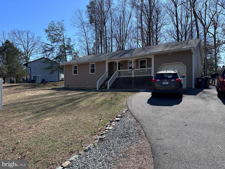 Great opportunity for main level living. This 3 bedroom 2 bath home is located in Vista Woods. An established community with no HOA! Jan 2023 HVAC; 2022 Vinyl siding; recently painted; the following are only a few  years old  stainless steel appliances, washer & dryer, and hot water heater. In addition to the beautiful interior, primary bedroom, primary bathroom, 2 bedrooms, and  a large full bath with ceramic tile; there is an expansive lawn with your own private playground and firepit! This home is located close to shopping, dining and 4 miles to I-95 /I-95 EzPass lanes and commuting options; minutes to the back gate of Quantico; and our rail station VRE within 20 mins.  Easy to show! Call your agent to schedule a showing today!  This will not last long!