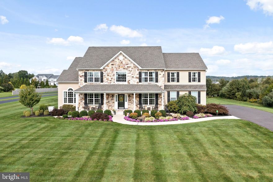 Welcome home to this exquisite 2015 model home in the award-winning Spring-Ford School District! This beautiful home boasts 4 bedrooms, 3.5 bathrooms, a 3 car garage, fully finished basement, and over 5,000 finished square feet.

As you enter this home you will immediately feel the comfort and elegance of its design. You will be greeted by the two-story foyer with natural sunlight and gleaming hardwood floors. Make your way through the formal living room to the spacious flex room with 12’ ceilings and custom wet bar. This room has endless options and would be a great space for an office or entertainment area. The great room speaks for itself. Spacious enough to host family and friends, coiffured ceiling, and a free-floating gas fireplace with quarry cut stone from floor to ceiling. Just steps away is the spacious gourmet, eat in kitchen. The kitchen boasts 42” cabinets, granite oversized center island equipped with stainless steel appliances, a 5-burner gas cooktop, double wall ovens, and large pantry. Just past the butterfly staircase you will find the mudroom/laundry room, with direct access to the garage. This level is completed with a formal dining room with wainscoting and a half bath.

Make your way upstairs to the lavish owner suite featuring two oversized closets with California Closet inserts and a luxurious spa like bathroom with separate vanities, soaking tub, and tile shower with bench. This floor features three additional bedrooms, each with recessed lighting, two sharing a hallway bathroom, while the third enjoys the luxury of its own en-suite bath.

If that is not enough, downstairs you will find a fully finished basement with ample space for entertainment, a second wet bar, gas fireplace, and flex room which could be used for remote working, a workout space, and more! Additionally, there is plenty of unfinished space for all your storage needs.

Just through the kitchen you will access the screened in porch. This space features a BBQ area with gas grill, recessed lighting, and ceiling fan for relaxing on those warmer summer nights. The fenced in yard is perfect for those with pets or children. The almost two acres of space will leave you with plenty of room for imagination.

But that’s not it! This home has many amazing features and builder upgrades – a whole house generator, house alarm system, sound system throughout, $27k lighting package, new shed, no association, and more! You must see it to believe it. Book your private showing today!
