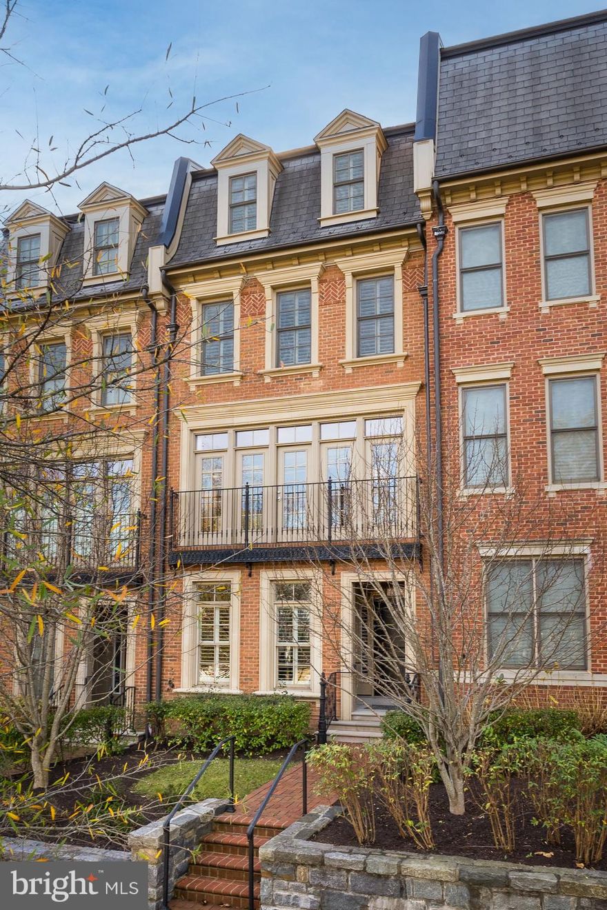Everything about this four-level, four-bedroom, four-and-one-half-bath town home in Symphony Park in North Bethesda will be music to your ears. This award-winning community of luxury brownstone city homes is adjacent to the Strathmore Music Center and Symphony Hall and enjoys close proximity to the Grosvenor-Strathmore Red Line Metro Station.Â 
The interior is light and bright with a southern exposure in the rear, overlooking green space, a pond, and stream valley, especially enjoyable from the two rear decks.Â Numerous custom upgrades include four levels of dark hardwood flooring, numerous built-ins, updated Powder Room,Â plantation shutters, and white designer cabinetry and marble countertops in the Kitchen.  This home boasts an open floor plan, highÂ ceilings, and beautiful custom moldings throughout. 
The entry level has aÂ Bedroom with an ensuite Bathroom,Â an Office or future Gym, entry hall with closet and built-in, and access to the two-car Garage.  Outside the Garage is driveway parking for two additional vehicles. The main level has an inviting Living Room with a wall of windows and adjacent Dining Room with a beautiful Thomas Pheasant chandelier. The gourmet Kitchen features a large center island, Viking and Miele appliances, and a large pantry.  The Kitchen opens to the cozyÂ Family Room, which includes space for a breakfast table and a gas fireplace surrounded by built-in shelving. The adjacent Deck has upgraded wood flooring and a gas hook-up perfect for outdoor grilling.Â The Primary Bedroom Suite on the upper level is light-filled with its floor-to-ceiling windows, a large walk-in closet, and elegant marble Primary Bathroom with Waterworks sinks, faucets, and tub, and an oversized separate shower. An additional Bedroom with ensuite full Bathroom, and laundry room completes this floor. The top level provides additional space with a large Sitting Room, spectacular views from a second Deck, and a fourthÂ Bedroom with ensuite full Bathroom.Â  Community common areas feature ornamental fountains and statues, landscaped gardens and walkways to the music and arts venue.
Area residents enjoy easy access to Whole Foods, Starbucks, Pike & Rose, and Wildwood Shopping Center, great restaurants, and retail, as well as easy access to 1-495 and I-270. Contact Listing Agent to Schedule Showing.