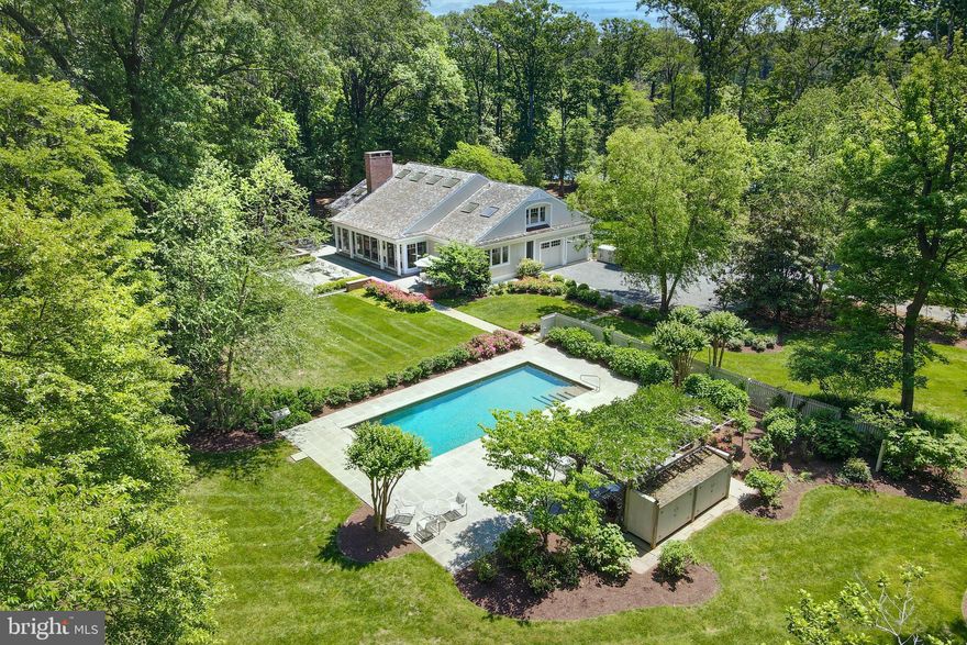 Privacy and serenity will greet you at this 17+ acre Eastern Shore waterfront oasis  on  a lovely point on pristine Harris Creek, offering convenient access to the Choptank River and Chesapeake Bay and just a ten minute drive to the shops, restaurants and fun to be found in historic St. Michaels. The property comprises a beautiful, 2006 custom-built coastal home with  water views from every room through walls of floor to ceiling windows and doors,  There are  vaulted ceilings, fireplaces and  large welcoming spaces inside and out.  All primary rooms open to handsome stone terraces.  An all-white chef's kitchen, pantry and  laundry room are on one side of the central great room,  and a lovely first floor bedroom and  study with fireplace  may be found on  the other side.  Three more bedrooms and two baths are on the 2nd floor.  Also on the property is a wonderful  recently resurfaced tennis court;  gorgeous  newly-refurbished heated pool with stone terraces;  and a charming  two-story guest house. There is an over-sized,  two-car garage discretely attached to the main house,  and an additional,  4-bay detached garage   sited off the private tree-lined driveway with ample additional parking areas. The property is  beautifully landscaped and maintained, offering a gracious balance of grassy clearings,  manicured gardens, and gently wooded areas from which to gaze at the water, the sunsets and beauty all around.   A dock is located on Meeting House Cove portion of the property.  Please see FLOOR PLANS for all of the structures and plat of the property.