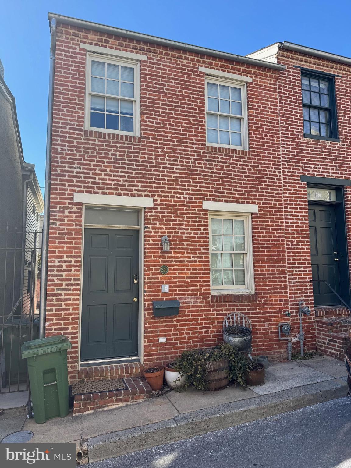 Located in the vibrant Upper Fells Point neighborhood, 240 S Chapel Street is a charming 2-bedroom, 1.5-bath brick townhome that blends historic character with modern updates. Renovated within the last decade, the home features hardwood floors throughout, exposed beams in the front bedroom, and a private rear patio perfect for outdoor dining or relaxing. The open layout includes a well-appointed kitchen with gas appliances and in-unit laundry for added convenience. Just steps from Patterson Park, Johns Hopkins, and the waterfront attractions of Fells Point, this residence offers urban living with neighborhood charm.