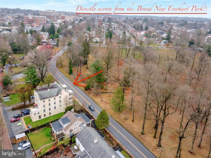Have you been on the hunt for a charming, move-in ready apartment located in the very desirable West Chester borough? Then look no further! As soon as you pull up to 605 W Miner you can’t help but notice the well-maintained landscaping and front patio welcoming you into the building. Walk through the main entrance of the building and you will find a common foyer area. The front door to 2W is up the stairs and to the right. As soon as you enter you immediately notice the original hardwood floors, fresh paint, and aesthetically pleasing fireplace. This apartment is full of character! To the left, situated at the front of the apartment, is a bright sunroom with large windows on each exterior wall allowing tons of natural light to stream in. This room is the perfect space to sip on your morning cup of coffee and look out at Everhart Park – one of the most beautiful parks in the borough! The kitchen is situated right off of the living room and has no shortage of natural light – the pass-through window doubles as a kitchen table and ties the rooms together to make the perfect space for entertaining. On your way down the hallway, you’ll find not one but two spacious closets meeting all of your food or clothing storage needs. Continuing down the hallway you are greeted with two generous bedrooms completed with fresh paint and additional closet space. A full hallway bathroom, and back entrance complete this floor. The back entrance leads to the two off street parking spaces which are monitored by the exterior security cameras and are accessed by a quiet alley. In the basement of the building you will find the washer, dryer and additional storage space. Location, location, location – this apartment is located directly across from Everhart Park and is a short walk to tons of restaurants, bars, boutiques, and shopping. This apartment is truly the best of both worlds offering the peace and tranquility of the suburbs with energy and entertainment just a few blocks away giving one a taste of everything West Chester borough has to offer! This gem will not last long. Book your showing today!