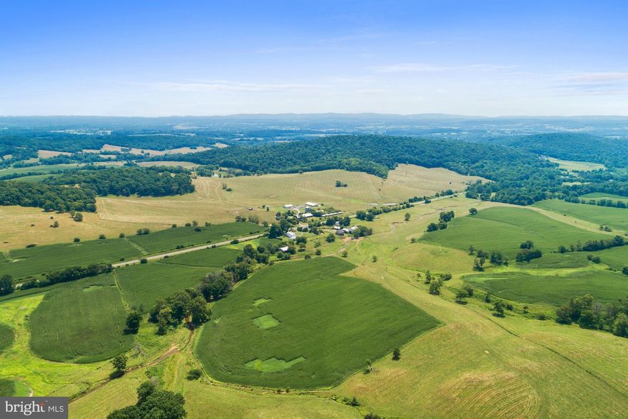 Fleetwood Farm - West showcases the rolling hills and majestic mountain views that Virginia's Hunt Country is known for. Comprised of 17 parcels totaling 1326+/- acres of mature farmland, this massive plot sits a mere 60 miles west of Washington DC. On the property are 4 rental homes and a historic stone mill, c. 1820, Crooked Run, and pond. Located a stone's throw from Sky Meadows State Park and multiple country towns, there are ample trails and local activities to enjoy. Access to the property is a snap with road frontage that includes Route 17 and Leeds Manor Rd. This is a phenomenal investment opportunity! Not in conservation easement.