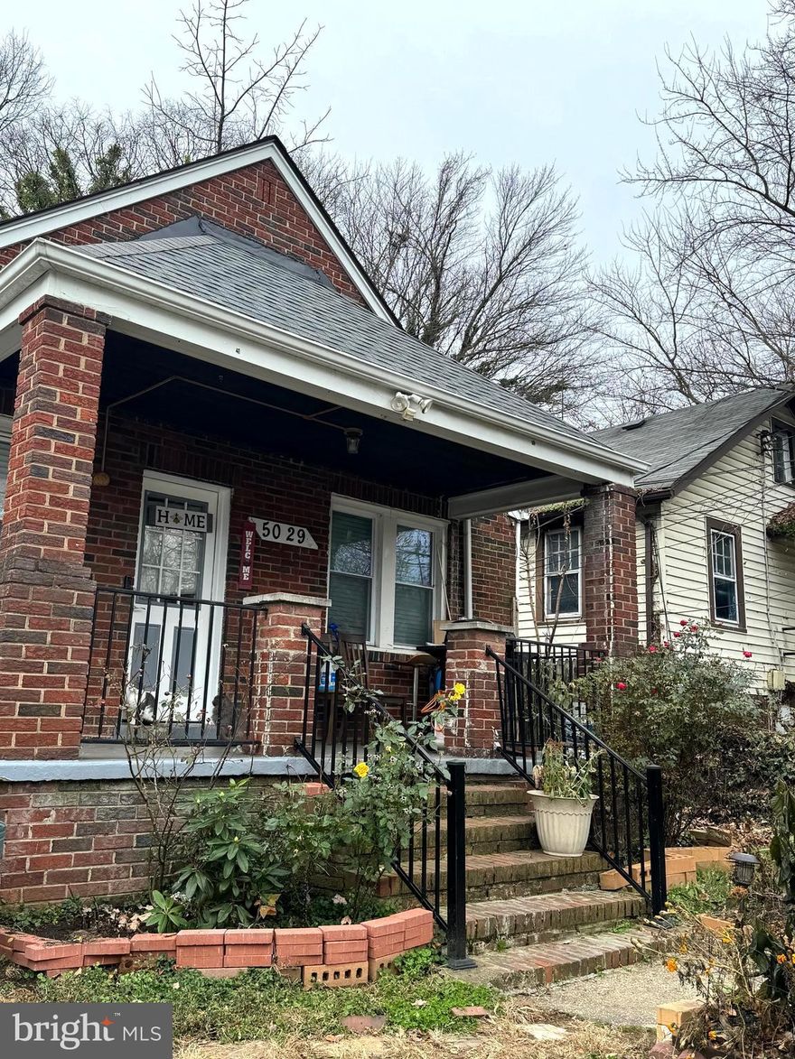 Small and cozy all brick bungaloo with three levels. Needs TLC but very strong bones. Fully finished basement, exterior basement access on the back of the property. Sold As-IS Conditions