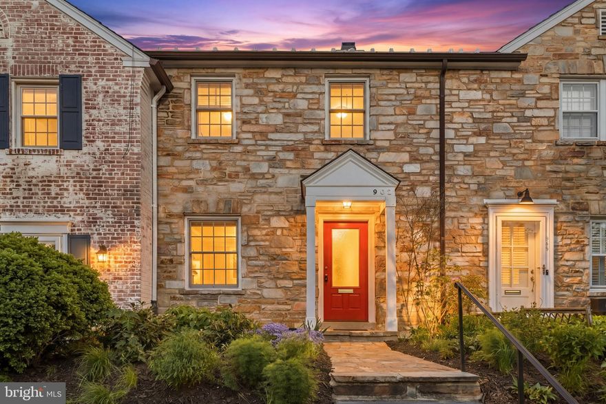 Nestled in historic Old Town Alexandria, this charming city-style townhome showcases timeless appeal with its distinctive stone front and inviting presence. Upon entry, a modern front door opens to reveal beautiful wood floors that flow throughout the main level, leading into a warm and welcoming living room complete with a built-in bookshelf and a cozy wood-burning fireplace.

The home exudes calm and sophistication with its neutral palette, elegant moldings, and thoughtfully designed spaces. The chef's kitchen is a true standout, featuring top-of-the-line Sub-Zero, Miele, and Viking appliances, pristine white cabinetry, and a custom backsplash that adds both style and function.

Just off the dining area, the sunroom addition offers an abundance of natural light—perfect for relaxing while overlooking the beautifully landscaped backyard. Enjoy seasonal plantings, mature trees for shade, and a private oasis enclosed by a brick-lined fence. The paved patio creates an ideal setting for outdoor entertaining or quiet moments at home.

Upstairs, wood floors continue through two well-appointed bedrooms, enhancing the home’s airy and cohesive feel. The bathroom features heated floors for added comfort.

The lower level provides versatile living space, ideal for a home office, recreation area, or optional third bedroom. A rare walk-up access to the backyard adds convenience and flexibility—perfect for guests, rental opportunities, or everyday ease. The home includes a dedicated parking space in the alley directly in front of it, but ample street parking is also available nearby for guests or additional space.   Premium location close to Old Town Alexandria Waterfront, shops and restaurants!   **NEW Copper Roof (rear and over sunroom) 2025**Gas Tankless Water Heater 2025**New Sunroom Siding 2026**Furnace and A/C 2024**Whole Home Dehumidifier 2025**