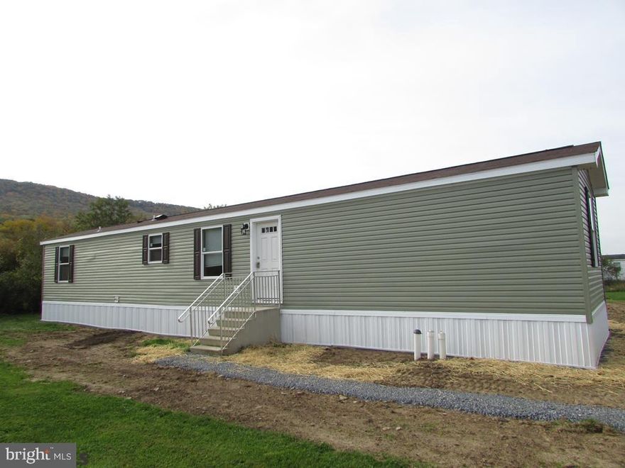 Welcome to the charming Eagle Creek Development! This 2022 Commodore Blazer Select is ripe for the picking. When you enter you will find an open kitchen, and living room (both with attractive easy to maintain vinyl flooring). The cathedral ceilings not only make the areas more spacious, but allows for more natural light. Making meals just got a whole lot more enjoyable in the well placed kitchen. Outside there is a pad for a future shed. You will be delighted to know that there is open area behind this property, so you can take in beautiful views of the surrounding mountains. Located 11 miles from Penn State University, 7 miles from University Park Airport, and 9 miles from Historic Bellefonte. This property won't last long. Scott L. Yocum is a Licensed Real Estate Broker in the state of Pennsylvania and partner in this property.
***HOME IS AVAILABLE TO PURCHASE FOR $99,900.00 WITHOUT PURCHASING THE LOT. IN THIS CASE, THERE WOULD BE A LOT RENT OF $435.00 ADDITIONALLY PER MONTH***