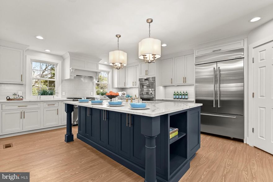 Prepare to be amazed.....Elegant, expansive in Running Brook where the neighborhood is largely surrounded by Fairway Hills Golf Course, lending a sense of peaceful quiet space, yet oh so cosmopolitan within convenient distance by path or sidewalk to Centennial Park,  Wilde Lake, Whole Foods, Merriweather district, dining, shopping and culture.  Brick front entry with sidewalk and newly designed landscape, open the front door framed by clear windows to a generous foyer with circular stair, flanked by living room and formal dining room.  The 2019  rear addition and creation of remarkable living and entertaining space, revealing a chef's kitchen that will rival one you might expect in property much higher in cost.  Table sized island, stainless steel appliances brands as you might see in restaurant production kitchens, large pantry, butler pantry styled serving and wet bar.  You will be impressed with the cutting-edge innovations hidden behind doors and drawers.  The photo gallery is worth a thousand words..... All of this excitement accessed by garage entry into main level laundry and a wide hallway for easy access; surrounded and open to the family room with wood-burning fireplace, steps from a magnificent screened porch with Trex flooring and ceiling fans to ensure a constant gentle summer breeze over-looking the fully fenced rear yard, shielded by mature trees and flowering bushes.  The upper level boasts a large primary bedroom with dual walk-in closets, private full bath and, an additional private space to serve as office, sitting room or nursery.  3 additional secondary bedrooms all spacious and share a generous hall bath with tub/shower and large vanity.  The lower level has been recently up-dated and is finished for that over-flow hobby, gym or party-recreation room.  This beautiful home has many recent improvements and does not show its age.  Replaced windows , HVAC systems, flooring, freshly painted, updated garage to include new front door and EV charger.  You'll never want to leave, and, with ample street parking, neither will your visitors!  Welcome Home.