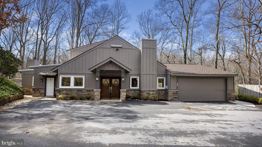 Nestled in lush, wooded surroundings, this exquisite home boasts a beautiful yard complete with a deck, fire pit, and an enclosed sauna. The charming property, featuring a lovely cathedral ceiling, has been recently renovated and offers convenient proximity to Seneca State Park, with easy access to the amenities of the Kentlands/Lakelands and Crown Farm area. Situated in the esteemed Quince Orchard high school district, this home is a tranquil oasis surrounded by verdant woods.

The interior of the residence showcases two wood-burning fireplaces, elegant bamboo floors, and a chef's kitchen equipped with quartz countertops and stainless steel appliances. The spacious master bedroom features a luxurious en suite bathroom adorned with Porcelanosa tiles, a lavish Porcelanosa freestanding bathtub, ample cabinets & lighting from the prestigious brand "Restoration Hardware", a cozy sitting area, and a versatile space suitable for use as an office, gym, nursery, or hobby room. Additionally, the main floor features three additional bedrooms and two beautifully renovated bathrooms adorned with custom natural stone and tile work. A powder room is also conveniently located in the spacious family room area, complemented by a wood-burning fireplace.

With a serene ambiance reminiscent of a secluded tree house retreat, this home offers a peaceful sanctuary for relaxation and enjoyment, inviting you to bask in your own personal paradise.