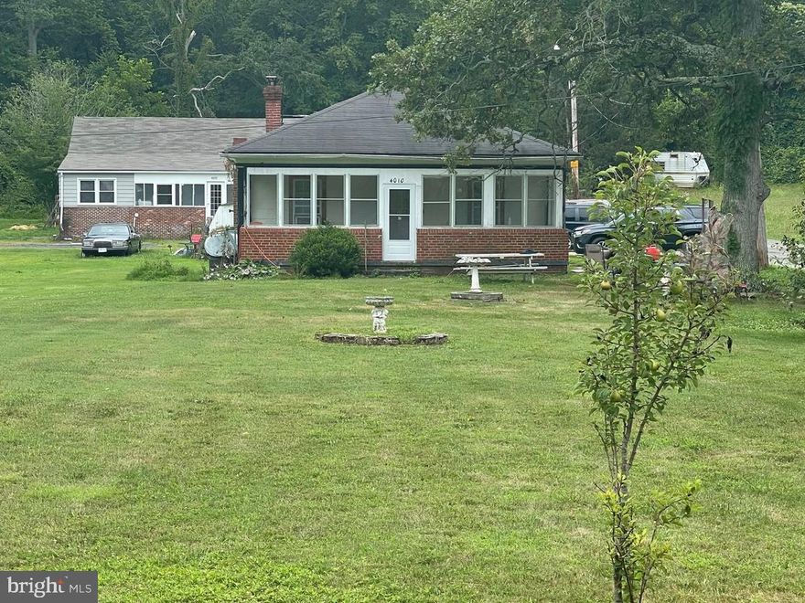 The home is in a peaceful residential district with 1,823 square feet, which needs complete recovery! 1.1-acre lot with 3 bedrooms one bathroom with enclosed porch, the second home is a tiny house, so bring your ideas. Must accompany agent.  Cash Only.