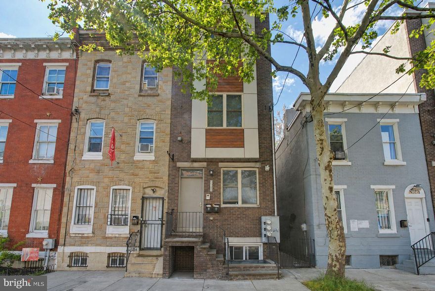 Turnkey 2018 duplex at $435,000, leased through July 31, 2027, at $50,100/yr. This prices to an 8.99% CAP and 8.68 GRM with 2 years of tax abatement remaining. Even after Philly's reassessment-on-sale, the CAP still holds at 7.99%. At 25% down and 6.75%, the deal returns $13,705/yr in cash flow, 12.6% cash-on-cash, and 1.54 DSCR. Note that pictures have been virtually staged/decluttered. Some bedrooms are currently under-occupied through August 2026, though the owner is willing to compensate the rents to the 2026-2027 term if closed before August. 
Located on the 1700 block of Bouvier, one of the most popular student blocks in the Temple corridor (7-minute walk to campus and SEPTA, clean street, surrounded by other student housing). Temple has had a rough enrollment stretch, which is partly why these asset prices are attractive today. New president John Fry, who reshaped Drexel's footprint during his tenure there, is now driving Temple's campus redevelopment and recruitment efforts, making enrollment more likely to trend upward than downward.
Two 4BR/2BA units, central HVAC, in-unit washer and dryer, and modern finishes. Unit A has backyard access; Unit B is larger. At $54,375 per bed and a 22% expense ratio, this outperforms the comp set and is one of the few 2018+ builds in the area trading near a 9 CAP. 3D tour and full underwriting available on request.