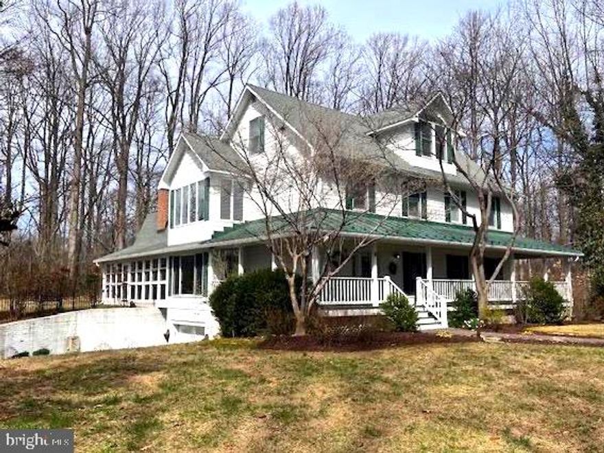 Remarkable 4 Bedroom ---4,163 Sq.Ft Finished Living Space Above Grade --- Beautiful Colonial Family Home located on 5+ PRIVATE wooded Acres in sought after HIATT's RUN Subdivision, at end of a  Cul-De-Sac.  Ready for a new family to enjoy for years to come.
A Curved and Paved Driveway slings through the woods to the home site. A  Flagstone Walkway leads to a Wrap Around Deck with Pine Ceiling.  
Inside:  Lots of unique and customized details. First Level back room has a Custom Tin Ceiling and Wood Panel surround for the wood burning fireplace  - and lots of windows overlooking the back deck/ backyard.   Kitchen has a Brazilian Granite top with Cherry Cabinets and Butlers Sink, overhang Granite Top for   sitting spaces next to the Kitchen Table for those Family Breakfasts - with a huge Panorama Window.  On the other side of the kitchen is a formal Dining Room with French Doors to the Deck - which flows into the large Living Room with Built -In bookcases - all on Red Oak # 2 hardwood floors. Custom wall colors throughout. Ohh, the laundry room is also on the first floor, between the Kitchen and the Fireplace Room and the Top Floor, all finished with a full Bath and a bedroom--AND a space used by the current owners for an ART STUDIO.
Your are greeted with an open sitting space on the second level, and again with large wonders that "takes in the outside".  To the rear is the "blue and paneled" bedroom - with built in drawers and more.  Another bedroom across from a  full and customized bathroom which is next to the Master Bedroom - see pictures...juts very well done.  The master Bedroom is tucked on the side of the second floor- large, quiet and with lots of windows.  3rd floor: Bedroom and ART STUDIO and a full Bath. 
basment: large TANDEM garage plus space for additional yard tools amd mowers, Additionally a LARGE separate room for a workshop etc.  2 NEW electric water heaters installed March of 2023.  3 Bedroom Perc.