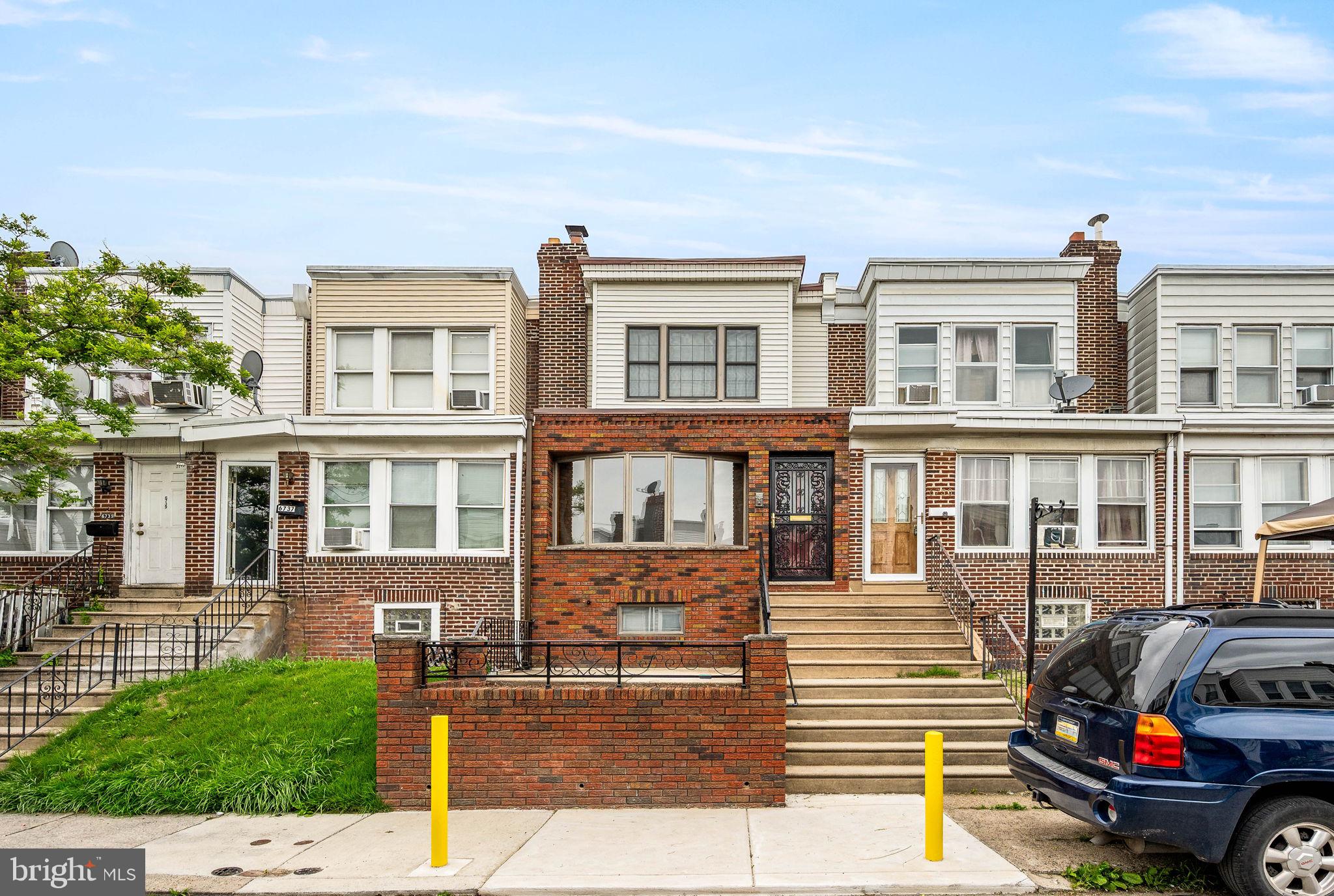 Welcome to this beautifully remodeled 3-bedroom, 1 bath large row home in the heart of Southwest Philadelphia, where modern upgrades meet timeless charm. From the moment you arrive, you’ll be impressed by the home's classic brick façade, elegant bow window, and inviting raised concrete patio—perfect for relaxing with morning coffee or evening conversation.
Step inside to find gleaming, refinished original hardwood floors that flow seamlessly through the spacious living room and formal dining room. The sun-drenched interior is enhanced by black-framed windows that add a stylish contrast and flood the home with natural light.
The updated eat-in kitchen is a showstopper, featuring crisp white shaker cabinets, large subway tile backsplash, striking black quartz countertops, and charming wainscoting detail—ideal for both cooking and entertaining.
Upstairs, you'll find three generously sized bedrooms, each with ample closet space and beautiful natural light. The finished basement offers additional living space, perfect for a home office, gym, or playroom, and includes a washer/dryer, convenient access to the garage and extra parking out back.
With thoughtful upgrades throughout and exceptional curb appeal, this home is move-in ready and waiting for its next chapter. Don’t miss your chance to own this gem in one of Southwest Philly’s most established neighborhoods!
Located just down the street from Finnigan Playground, offering access to a public pool, basketball courts, baseball fields, hockey rink, and playground—perfect for outdoor recreation and community enjoyment
This home may be eligible for free down payment assistance. Ask me how!