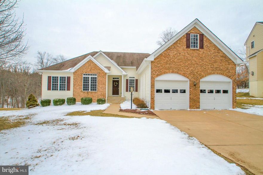 Pride of home ownership exudes in this lovely rambler with a finished basement. This home boasts over 3300 square feet! There are four bedrooms and four bathrooms! Basement is finished with a rec room, wet bar, exercise room, and a study or a 5th bedroom for guests (not to code). Walk out basement that backs to trees for privacy! Sit on your deck with your coffee and enjoy the beautiful scenery!