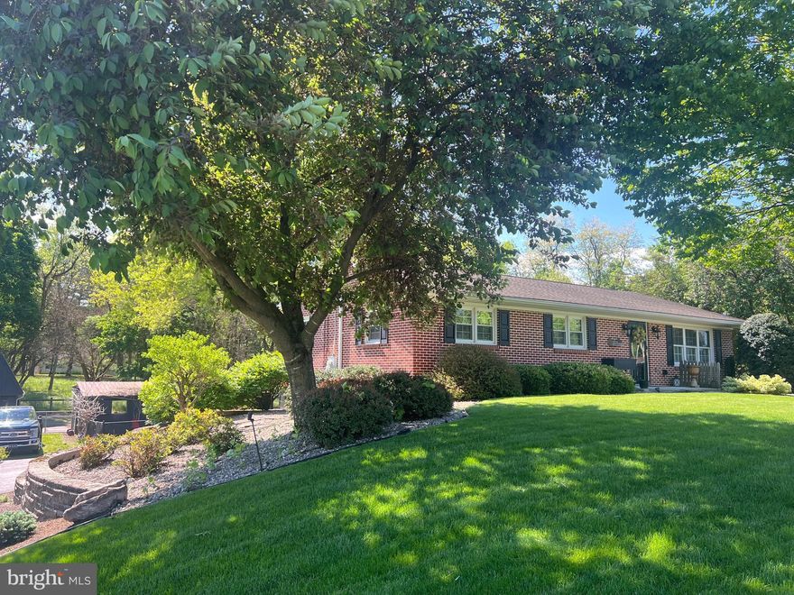 Unique and Amazing property!!!  Perfect set up for horses, goats or cattle. Solid built brick rancher with a walk out finished lower level. Three bedrooms and 1 1/2 baths, living room, dining area and renovated kitchen.  All rooms have hardwood flooring; one bedroom has carpet over the hardwood.  Appliances pass with the sale in the kitchen, range/oven, dishwasher, disposal, microwave and refrigerator.   Family room, dining area, 4th bedroom, laundry room, full bath with claw foot tub and shower stall and the utility room are in the walk out lower level.
Newer double pane, tilt windows, newer water heater, pellet stove, oil hot water furnace and newer Central Air.  Outside features a Pergola, a two-tier deck, concrete patio with fire pit leading to the above ground pool. Fencing for pastures, paddock and riding ring.  Storage shed, Barn/ 2 car garage with loft for hay storage.  Run in shed with three 12x12 stalls.