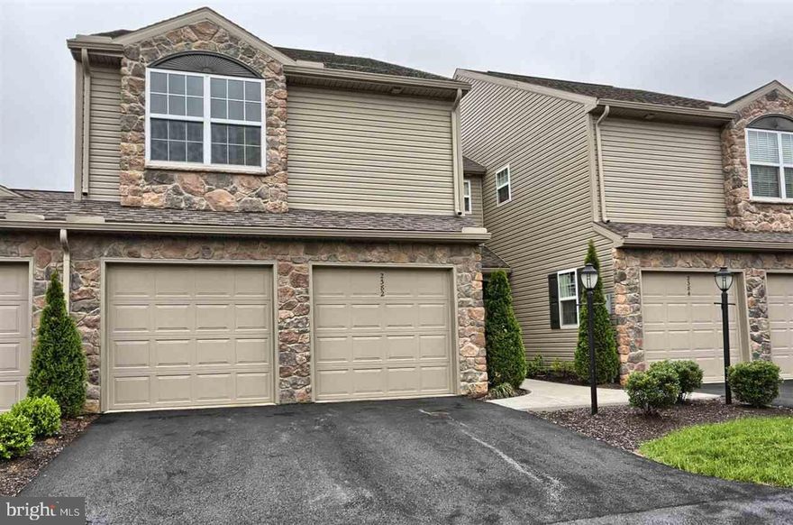 Beautiful townhome w/open floor plan flooded w/natural light! The kitchen features granite counter tops, cherry cabinets, breakfast bar, & matching appliances. Basement is finished featuring great open space to a walk out patio. Wall to wall carpeting and custom tile throughout w/laundry on 2L. Dining area to private deck & 2 car garage. Low HOA fee includes roof, siding, lawn, snow removal etc. Community center, clubhouse, pool, b-ball court, dog park, & more! 1yr home warranty and all appliances included