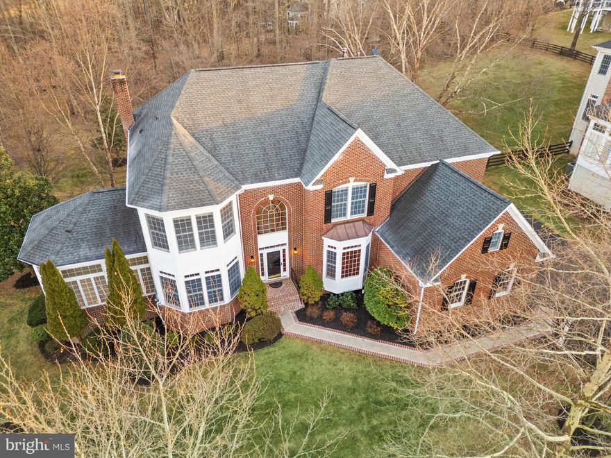 ***PROFESSIONAL PHOTOS COMING SOON***

Embraced by the tranquility of the Natural Conservancy, this beautiful 5-bedroom, 4.5-bath home offers the perfect balance of peaceful seclusion and everyday convenience on one of the best, private and protected lots in the highly regarded Lenah Run community.  You will enjoy direct access to scenic walking trails, a neighborhood playground, and a refreshing community pool — all just moments from essential dining, shopping, entertainment, Middleburg, wine/horse country, and transit. Set on almost three-fourths of an acre, this expanded home is a true haven. Step into the grand two-story foyer, where you’ll immediately appreciate the gleaming refinished hardwood floors that span the entire main level. The dining room features crown molding, chair rail, and abundant natural light, creating an inviting space for gatherings. Complimented by a large office and expansive seating/sunroom area. The heart of the home is the gourmet kitchen, thoughtfully designed with granite countertops, stainless steel appliances, double wall ovens, a new gas cooktop, a pantry, and an oversized island with counter seating. Adjacent to the kitchen is a family gathering area with a gas fireplace and an expansive great room with a stunning two-story stone fireplace, both filled with sunlight. A serene screened-in porch is ideal for year-round outdoor enjoyment and entertaining. All offering picturesque views of the lush backyard and preserved land. These spaces seamlessly blend indoor and outdoor beauty. The upper level has four spacious bedrooms. The primary bedroom is a private retreat featuring a tray ceiling, seating area, walk-in closet, and is graced by an expansive primary bath. Large double vanity, separate soaking tub, and shower. Three additional large bedrooms and two updated full baths are perfect for a large family or hosting guests. The finished walkout basement feels endless! With ample space for a large seating area, gaming tables, or even a large bar. Further complemented with the fifth bedroom, fourth full bath, a theatre room or gym, and endless storage.  Rare opportunity to own a piece of paradise in Lenah Run.