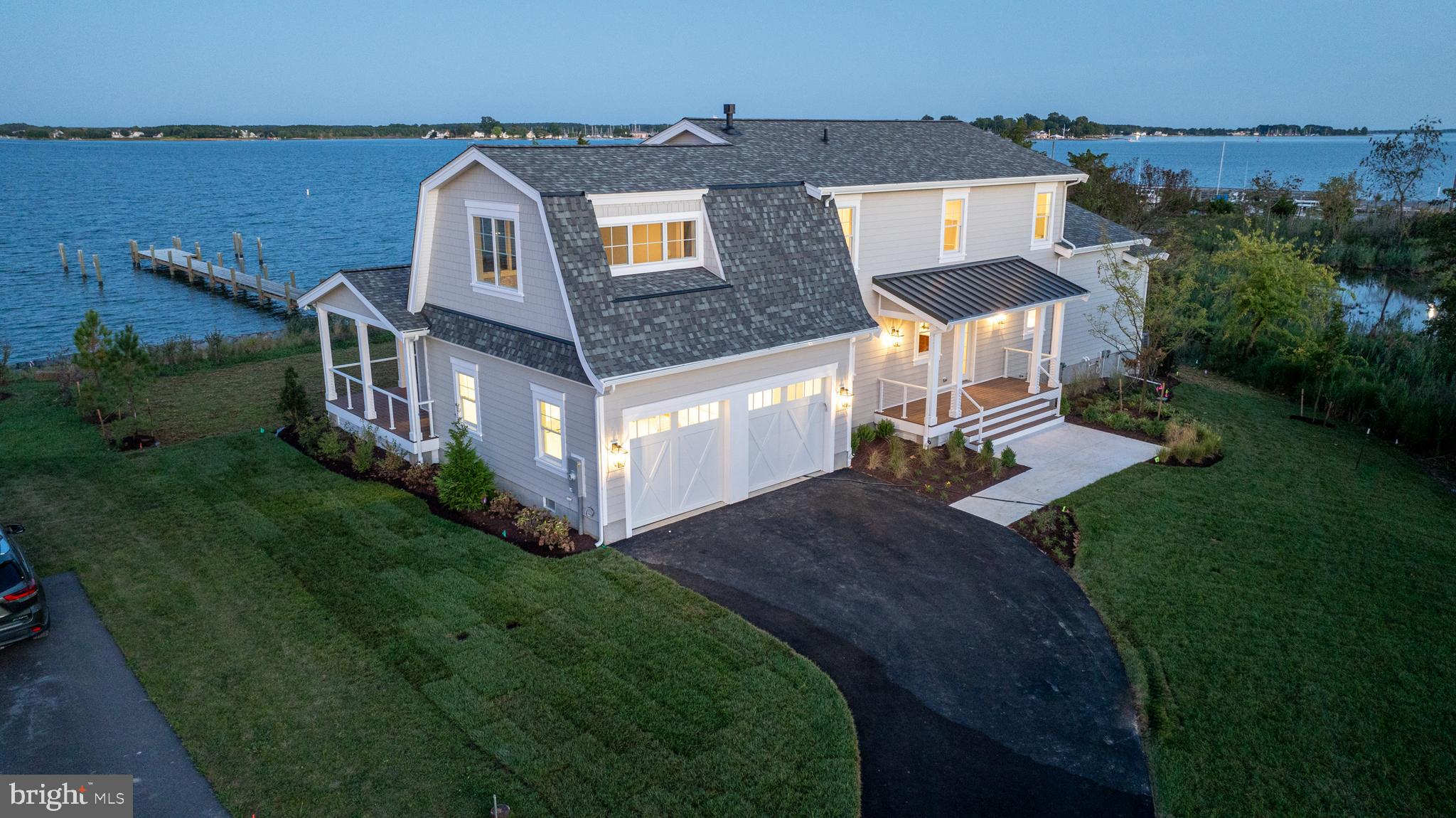 4 bedroom, 4.5 bath Coastal style home with in-ground pool and pier! Just 60' from the water, this is the epitome of waterfront living. Large second floor balcony, wrap-around porch, and open floor plan with wide banks of windows provide ample opportunity to enjoy the gorgeous water views. Main-level primary suite with dramatic cathedral ceiling and luxurious spa-like bath. Attached 2-car garage, approximately 325’ of shoreline with newly planted living shoreline. Easy year round living or second home on the Eastern Shore as the association handles lawn maintenance and snow removal. Centrally located between Easton and St Michaels and just a stone's throw from the Oxford Bellevue Ferry on the Tred Avon, Bellevue on the Tred Avon is just a short boat or ferry ride to Oxford’s restaurants, ice cream shop and waterfront park.