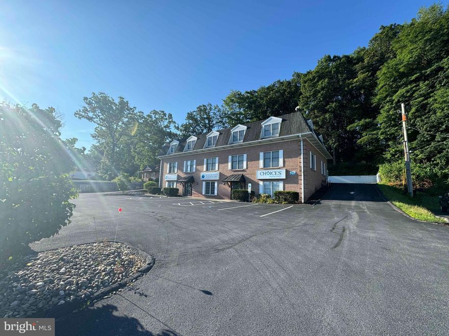 9,000 square foot office building right on N. Atherton. Use the whole space for your business or occupy what you need and lease the rest. Building conveniently breaks into three, 3,000 sf suites. Both lower and second level have at grade access. Brick cape cod style building with plenty of parking. Call today to schedule your showing.