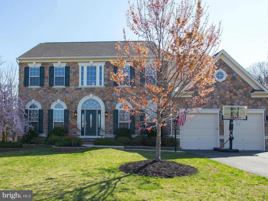 Elegant Home-Shows Like A Model. 5 BR 4.5 BA 5800sf. Lrg Gourmet Kitchen w/ Granite Countertops, SS Appliances. Hardwood Floors, Dual Stairway, Master w/ See-Through FirePlace & 2 Walk -In Closets. Sec System, 9'& 10' Ceilings, Custom Trim & Cabinets,  Huge Finished Walkout Basement. Stamped Concrete Patio w/ Beautiful Stone FirePlace. Hot Tub. Trek Deck, Underground Sprinkers, Prof Landscaping.