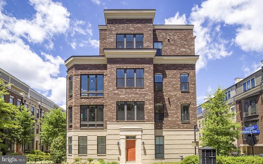 This end-unit townhome offers a modern layout with 3 bedrooms, 3 full and 2 half baths, and abundant natural light throughout. Designed for both comfort and functionality, it features spacious living areas and a versatile floor plan. Inside, rich hardwood floors, crown molding, and oversized windows create a bright, polished interior. The open main level features a chef’s kitchen with granite countertops, a large island, stainless steel appliances, ample cabinetry, and a gas fireplace with LED accents, seamlessly connecting to spacious living and dining areas. Each bedroom includes its own en-suite bath, while the primary suite boasts dual walk-in closets and a spa-like bath with double vanities and a glass-enclosed shower. Enjoy a private rooftop terrace, perfect for relaxing or entertaining. Ideally located near the vibrant dining, shopping, and entertainment options of National Harbor, along with scenic waterfront attractions, this home blends convenience with an exceptional lifestyle.