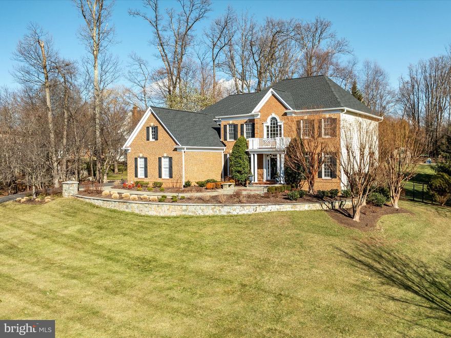 MULTIPLE OFFERS RECEIVED!  **OPEN HOUSE on Sunday, February 9 from 12 to 3**  Fabulous Estate Home sited on premier 1.16 acre home with extensive hardscape to include stone walkways, patios, and walls - iron rail fencing, sports court, play area, play house, and shade trees. Over 6000 sq feet of finished living space with amazing, serene Owners Suite to include sitting room with fireplace and wet bar. Three Bathrooms and Laundry Room on Upper Level. Gourmet Island Kitchen and Drop Zone from 3 car Garage. Floor to ceiling stone fireplace in Family Room. Main level Office or Bedroom.  Two Powder Rooms on Main Level. Walk out Lower Level with expansive Recreation Room, Full Bathroom and Private Den/Exercise/Guest area. Two large Storage Areas.  NEW Roof and HVACs. Refurbished Baths, Updated Kitchen, Plantation Shutters+Sonnette Roller Shades, Gorgeous trim work, Hardwoods through Main and Upper Level, High Ceilings, Irrigation System and Uplighting for trees.  NO HOA. Close proximity to Dulles airport, metro Silver Line, shopping of Reston Town Center and North Pointe Shopping Center plus extensive amenities and employment centers.  **Special Financing Incentives available on this property from SIRVA Mortgage**