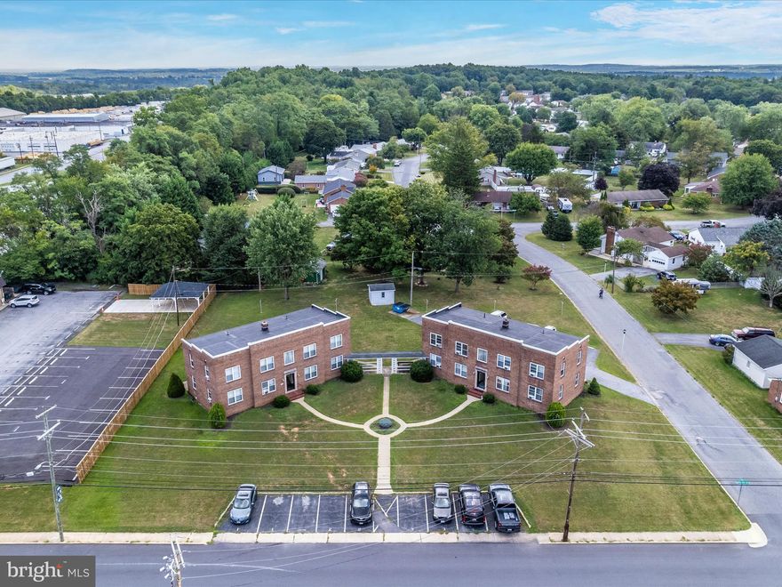 Great investment opportunity in Thurmont town limits. Property boasts almost an acre of land (.91) with 2 brick apartment buildings with 8 units total, ample off street parking,hardwood floors throughout,newer roof on both buildings and is fully rented with month to month leases. Close to schools and restaurants.
