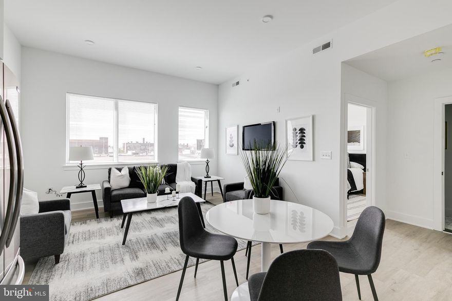 *Available NOW!*

Don’t miss the chance to live in a beautiful 52-unit apartment building at 2201 Washington Avenue! Situated in the charming Graduate Hospital neighborhood, this building is near many local conveniences, restaurants, and attractions that are sure to make for an enjoyable living experience. The walkability is unparalleled as you can reach the Schuylkill River Park, larger shops like Target and Sprouts Farmers Market, plus mom and pop businesses like The Sidecar Bar & Grille and Loco Pez, all by foot! Public transit is also accessible via Washington Avenue and Broad Street, and you are close to I-76 for zipping in and out of the city.

This sunny 1 bedroom, 1 bathroom apartment comes with modern finishes, including hardwood floors, central AC, in-unit laundry, as well as recessed lighting. Natural light is also abundant with multiple windows. The kitchen is beautifully designed with white cabinetry, quartz countertops, stainless steel appliances and honeycomb backsplash tiling. The contemporary full bathroom features a shower/tub and sleek vanity with a unique lighted mirror. Finally, enjoy building amenities that include a shared roof deck with stunning city views as well as a convenient bike storage room.

Lease Terms: Generally, 1st month and 1-month security deposit are due at, or prior to, lease signing. Landlord may require other terms such as last month's rent upfront—$ 65 application fee per applicant. Tenants are responsible for: electricity, gas (if applicable), cable/internet, and a $10/mo technology fee. Water is a flat monthly fee of $60. Additional fees or requirements may be applicable for units with Homeowners or Condo Associations.  Landlord Requirements: Applicants to make 3x the monthly rent in verifiable gross income, credit history to be considered, have no evictions within the past 5 years, and must have a verifiable rental history with on-time rental payments. Exceptions to these criteria may exist under the law and will be considered. Cosigners will be considered.

*Price reflects the net effective rent after a 6-week credit is applied on a 15-month lease at $1,515/mo.
*Pets are conditional on owner's approval and may require an additional fee; 1 dog OK (max 45 lbs), NO cats. $50/mo pet rent required if accepted.
*Photos of a similar unit.