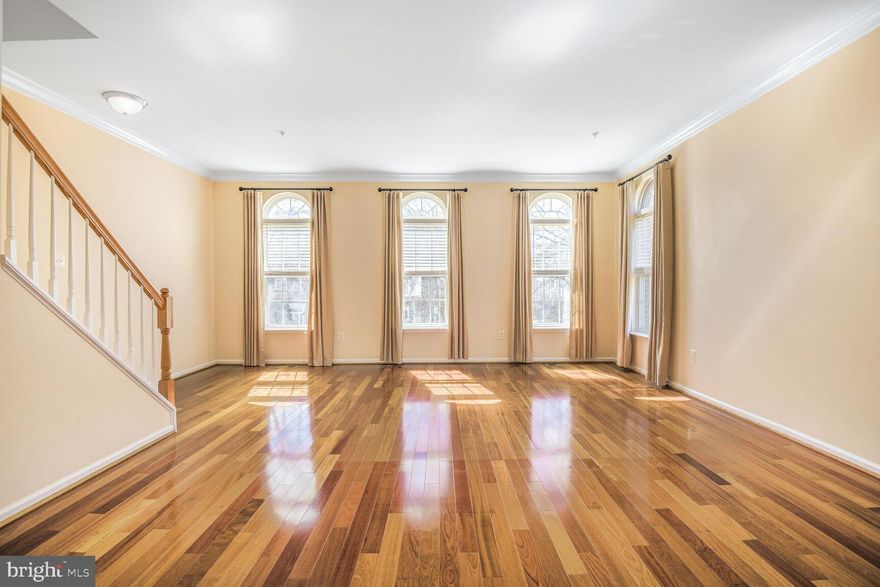 Rarely available end-unit townhouse in King Farm Watkins Pond!  3 levels of meticulously maintained, gently lived-in property. Lower level recently updated with luxury vinyl planks.   Main level has Brazilian Cherry solid hardwood flooring throughout.  Kitchen with center island and Corian countertops .   Upper level has 3 bedrooms and laundry.  Two car side-by-side garage, rear entrance. The well established neighborhood of King Farm has two community pools, parks and clubhouse.  Free shuttle to Shady Grove metro station.  Conveniently located 1/2 mile from I-270/370.  Please be sure to check out the virtual tour!  Offers reviewed as received.