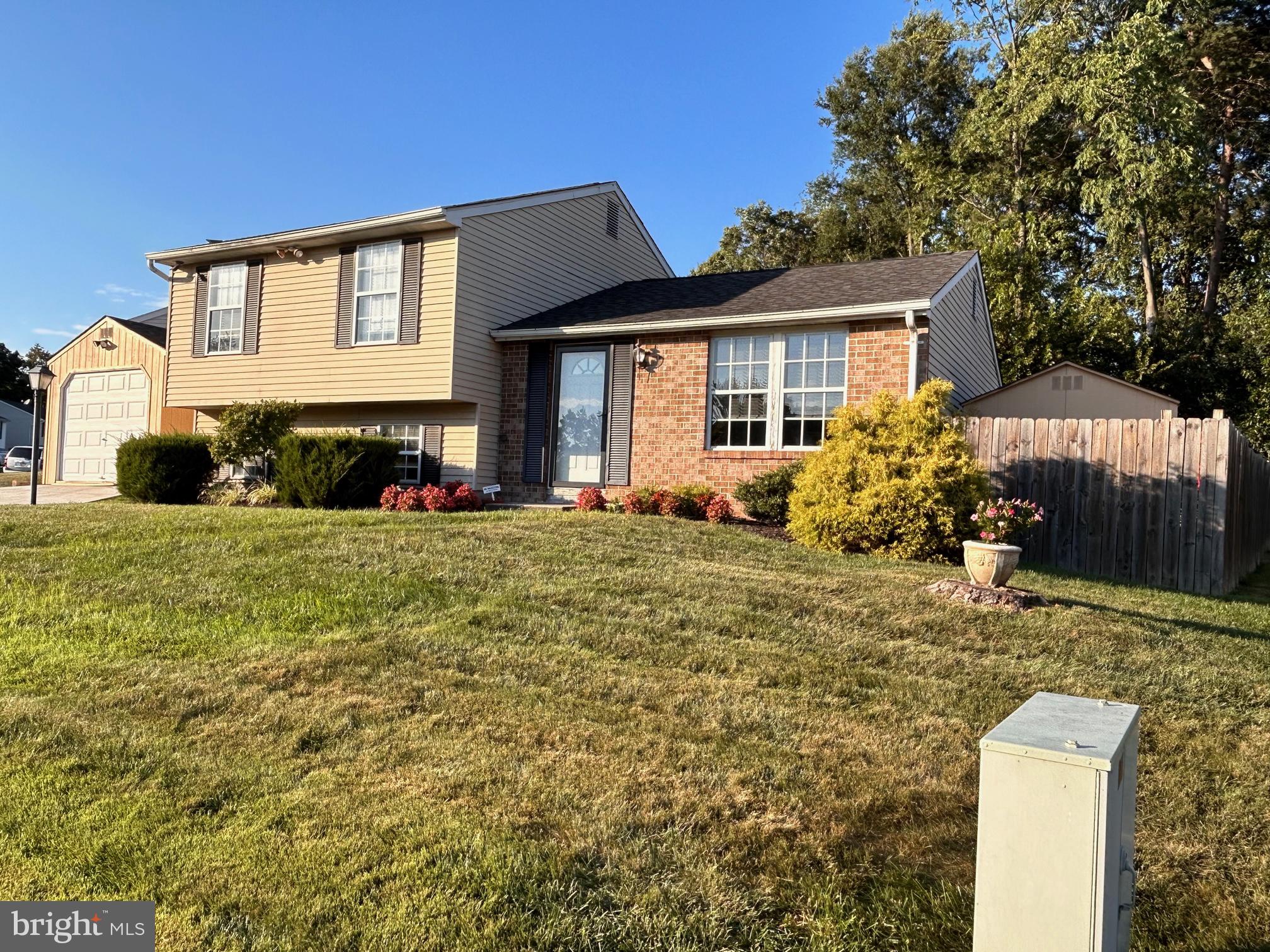 An updated split level like this in desirable Goldentree Estates rarely comes on the market! In fact the last time this sold it was a private sale! This opened floor plan house feel bright & sunny even on a cloudy day! The beautiful updated kitchen with stainless appliances, granite counter & ceramic tile backsplash opening to the dining room. The Primary Bedroom has a huge walk-in closet which does have a rough-in under flooring for a full bath. The third level easily allows multiple uses with a 1/2 bath. The backyard of this property was designed to enjoy for 3 Seasons & an Entertainer's Delight. This is a 3 level split & all 3 levels are finished.