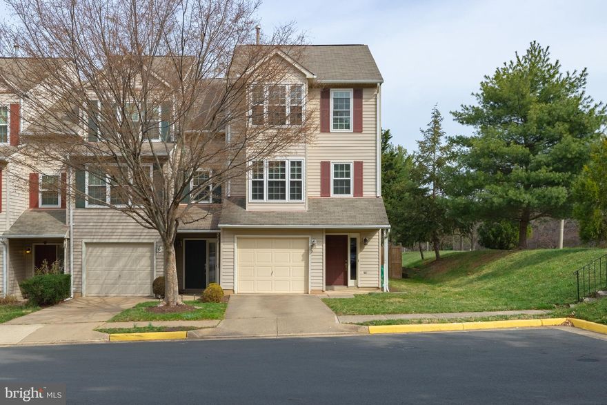 Imagine coming home to this gorgeous END UNIT townhome filled with tons of natural light!  Entry level welcomes you with bright, open foyer leading to large recreation room offering a separate space to relax or entertain your guests .   Walk out to large brick patio for private get togethers with family and friends, surrounded by trees and newly fenced backyard .  Walk up to main level where you will find an open floor plan, hardwood floors and extra windows.  Create a  meal for those you love in your gourmet kitchen.  Upgraded appliances, granite counters, backsplash, pantry, and kitchen island with seating completes this space.   Large pass-through from kitchen to dining and family rooms.   You'll create memories in the open and inviting living spaces filled with sunshine.  Gather around the gas fireplace for some informal entertaining or  step outside onto the deck and sip some hot chocolate after a long day while enjoying the view of trees.  Upstairs you will find the primary bedroom with an upgraded modern en-suite bathroom with comfort height vanity, custom closets and hardwood floors.  You will find two additional bedrooms with hardwood floors and an upgraded modern hall bath with comfort height vanity!  One car GARAGE is perfect for getting in and out of your home with convenience and ease.  Central LOCATION makes it so convenient to hop on major roads and highways - Commuters dream just off routes 29/28/66/286!  Close to restaurants and shopping.  You'll love the privacy of this end unit townhome!  Professional photos coming soon! Previous listing photos similar to current condition.